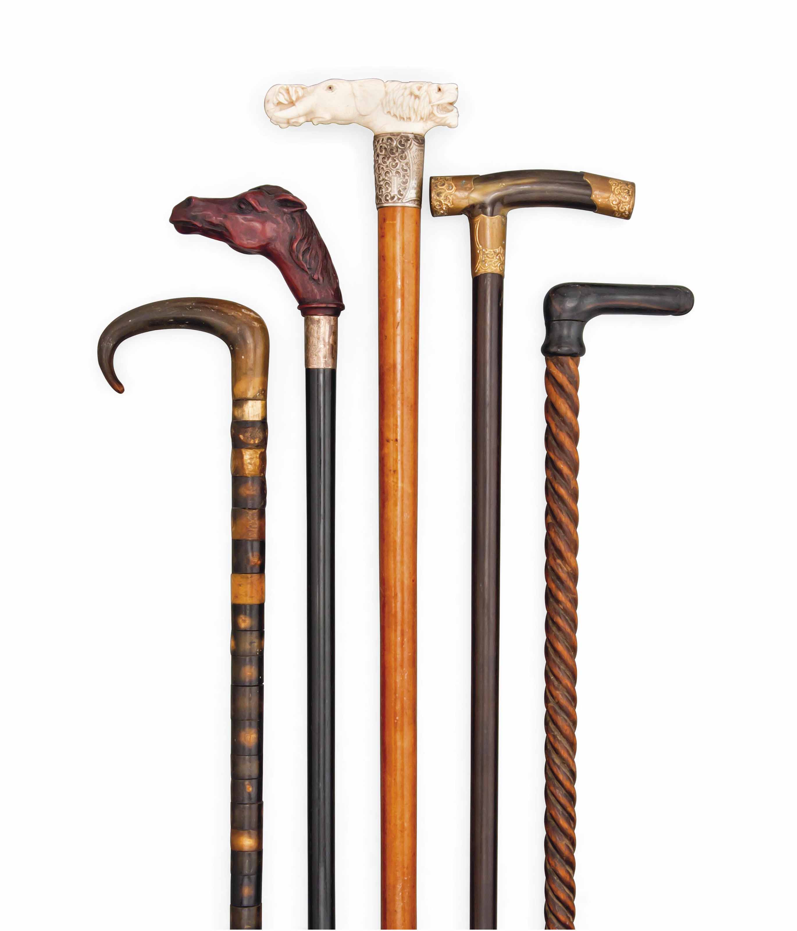 FIVE NOVELTY WALKING STICKS