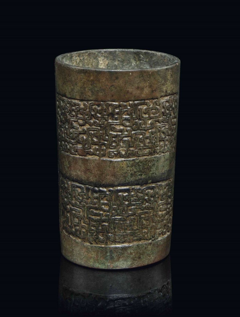 A CHINESE BRONZE CYLINDRICAL VESSEL , YUAN/MING DYNASTY (12711644