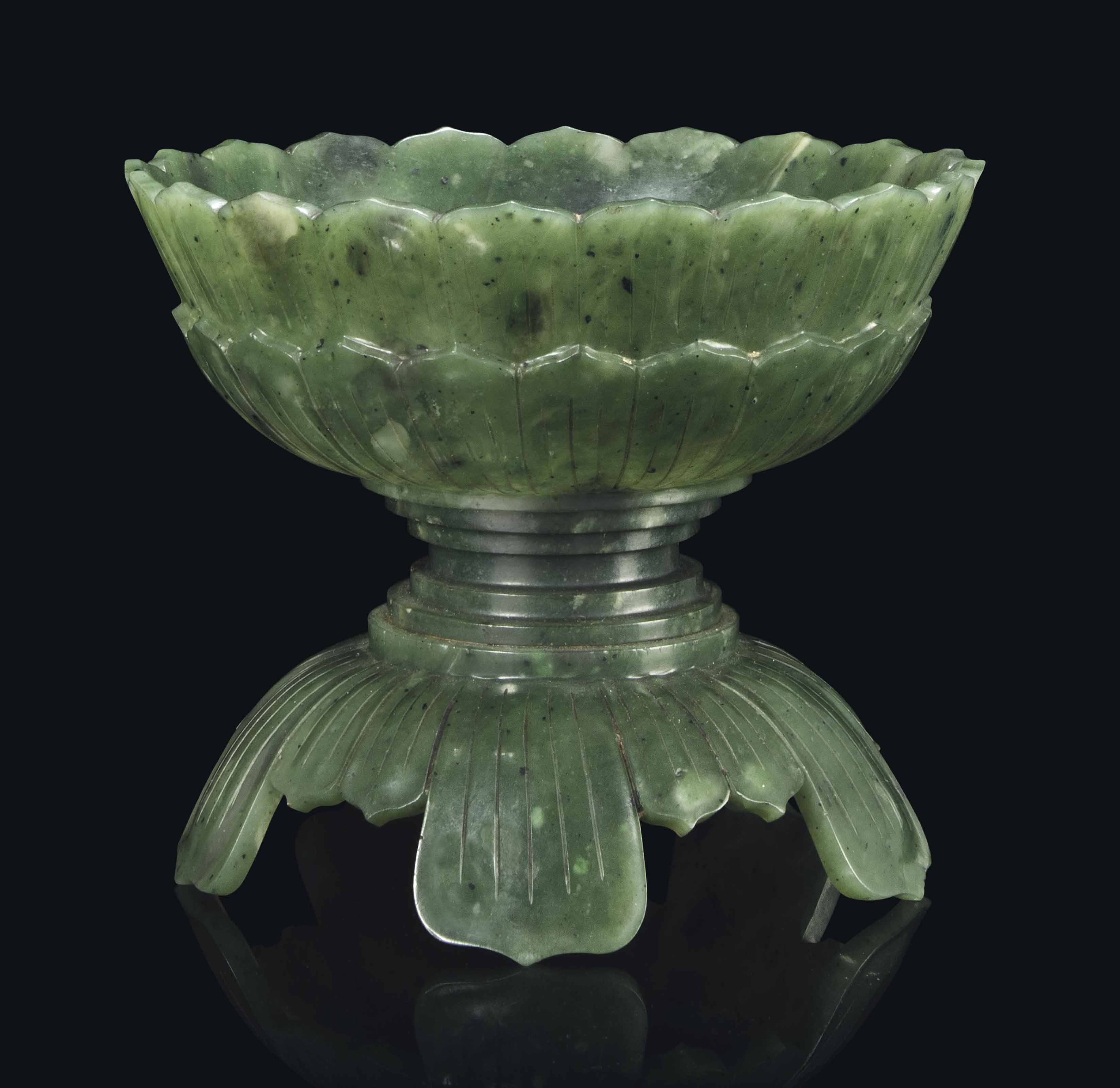A CHINESE SPINACH JADE LOTUSFORM STEM BOWL , 19TH CENTURY Christie's