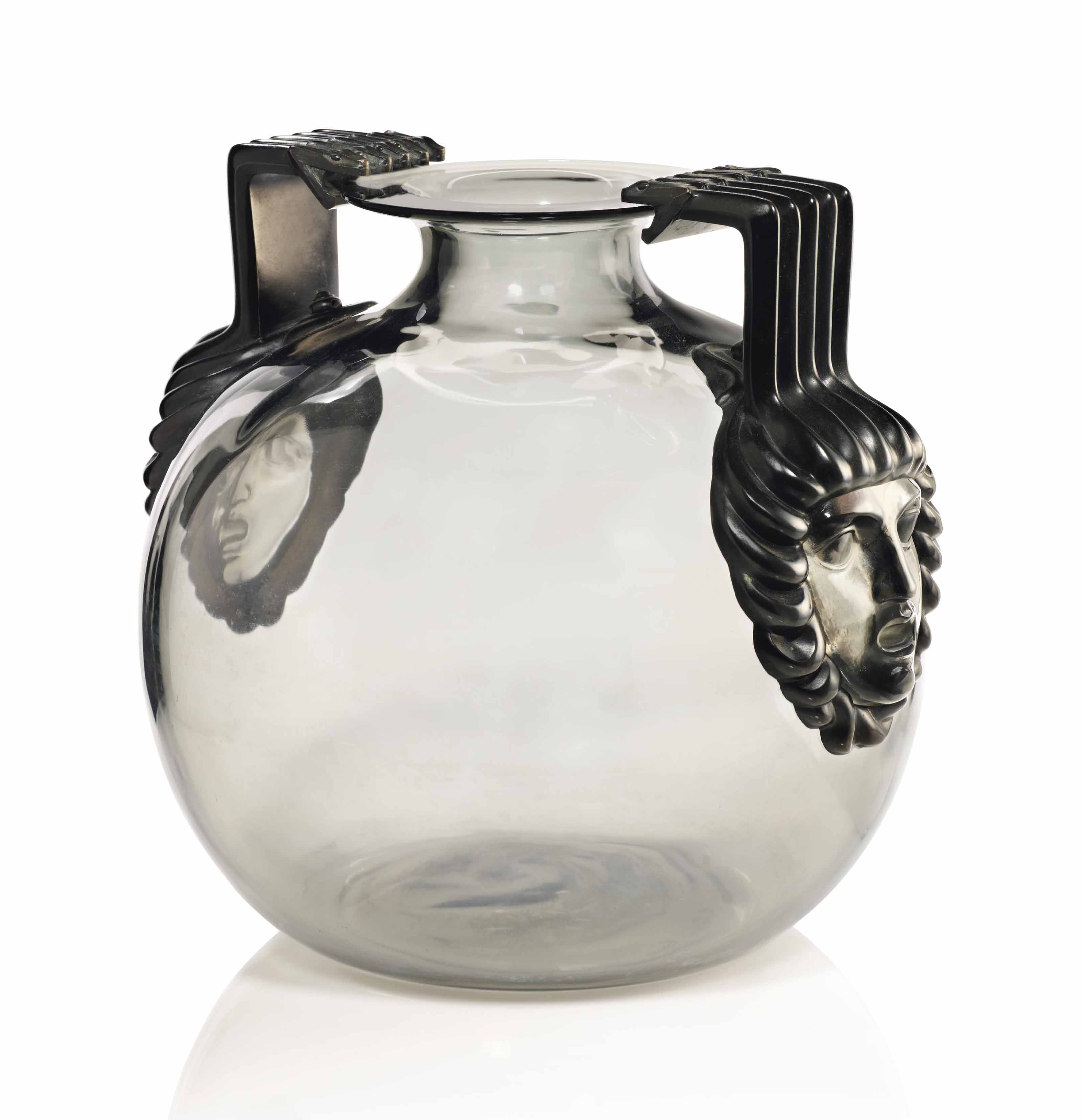 A rare &lsquo;Cluny&rsquo; vase, no. 961, designed 1925. Smoky glass with patinated bronze handles engraved R. Lalique France. 26.4 cm high. Sold for &pound;121,250 on 13 November 2012 at Christie&rsquo;s in London