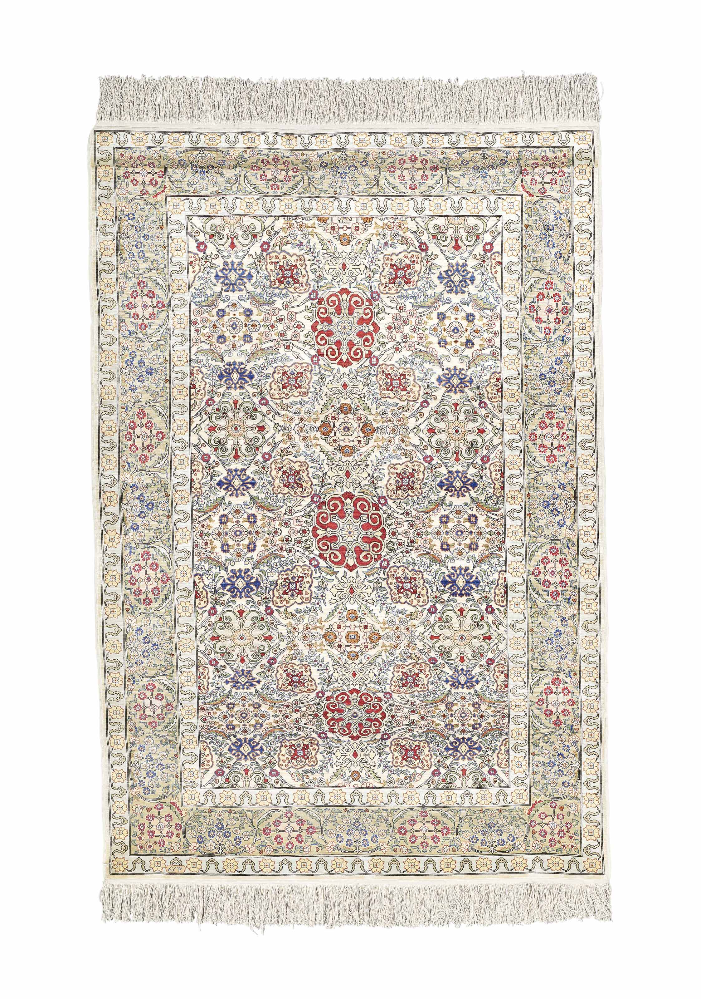 AN EXTREMELY FINE SILK HEREKE RUG, TURKEY , CIRCA SECOND HALF OF 20TH CENTURY Christie's