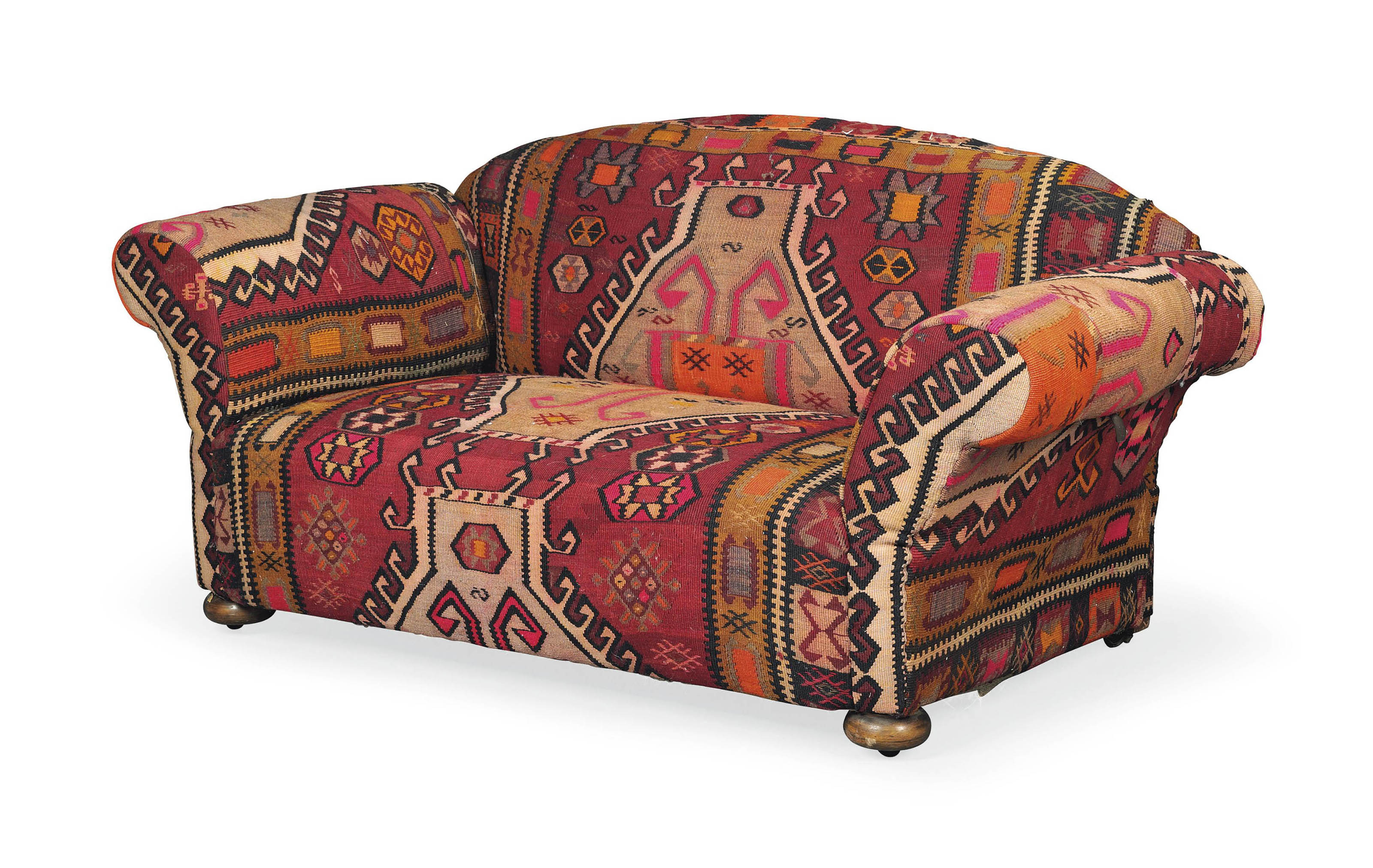 A SMALL KILIM UPHOLSTERED SOFA , CIRCA 1900 Christie's