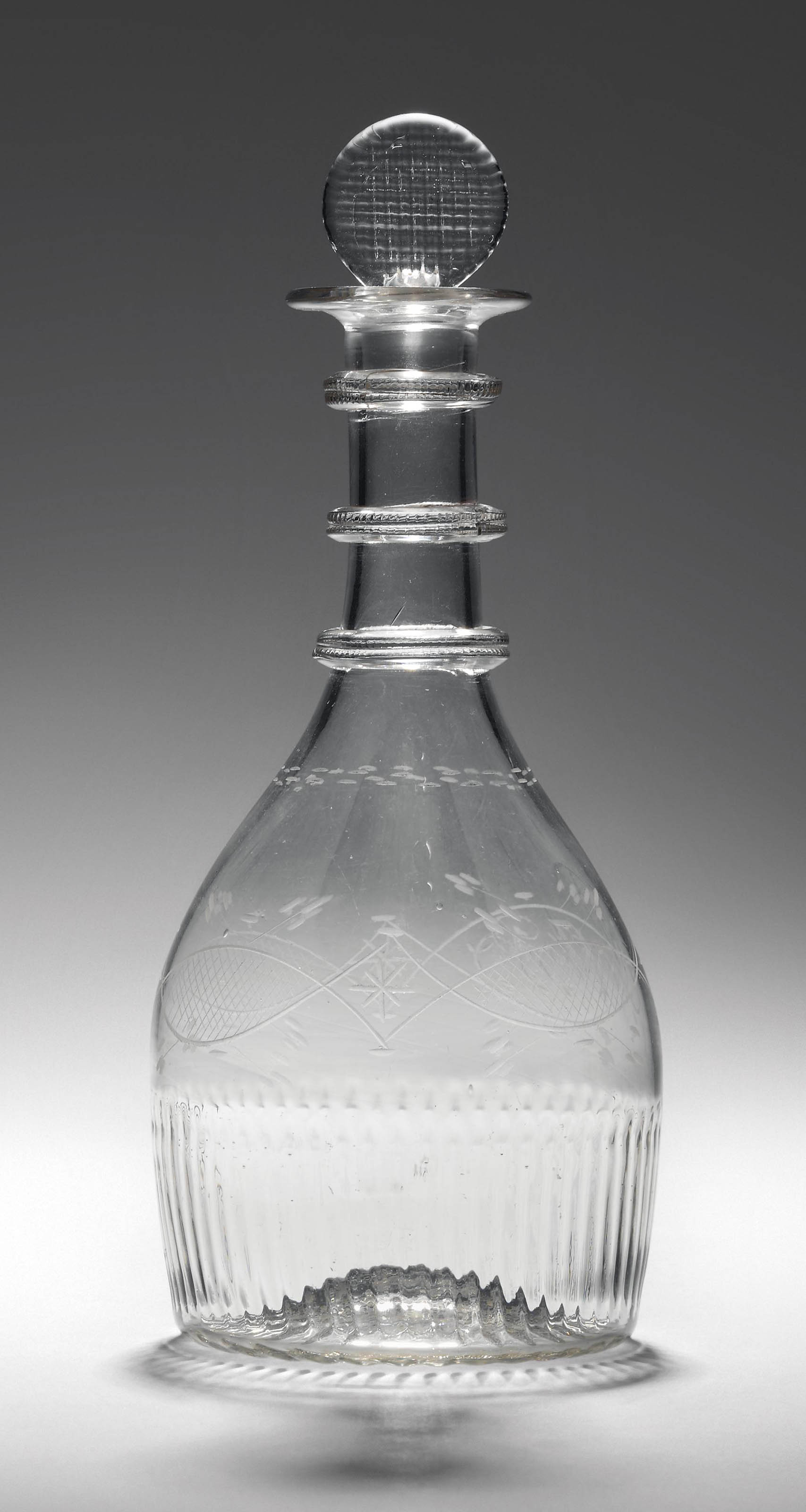 AN IRISH (CORK GLASS CO.) ENGRAVED GLASS DECANTER AND STOPPER , CIRCA 1800, MOULDED MARK TO BASE