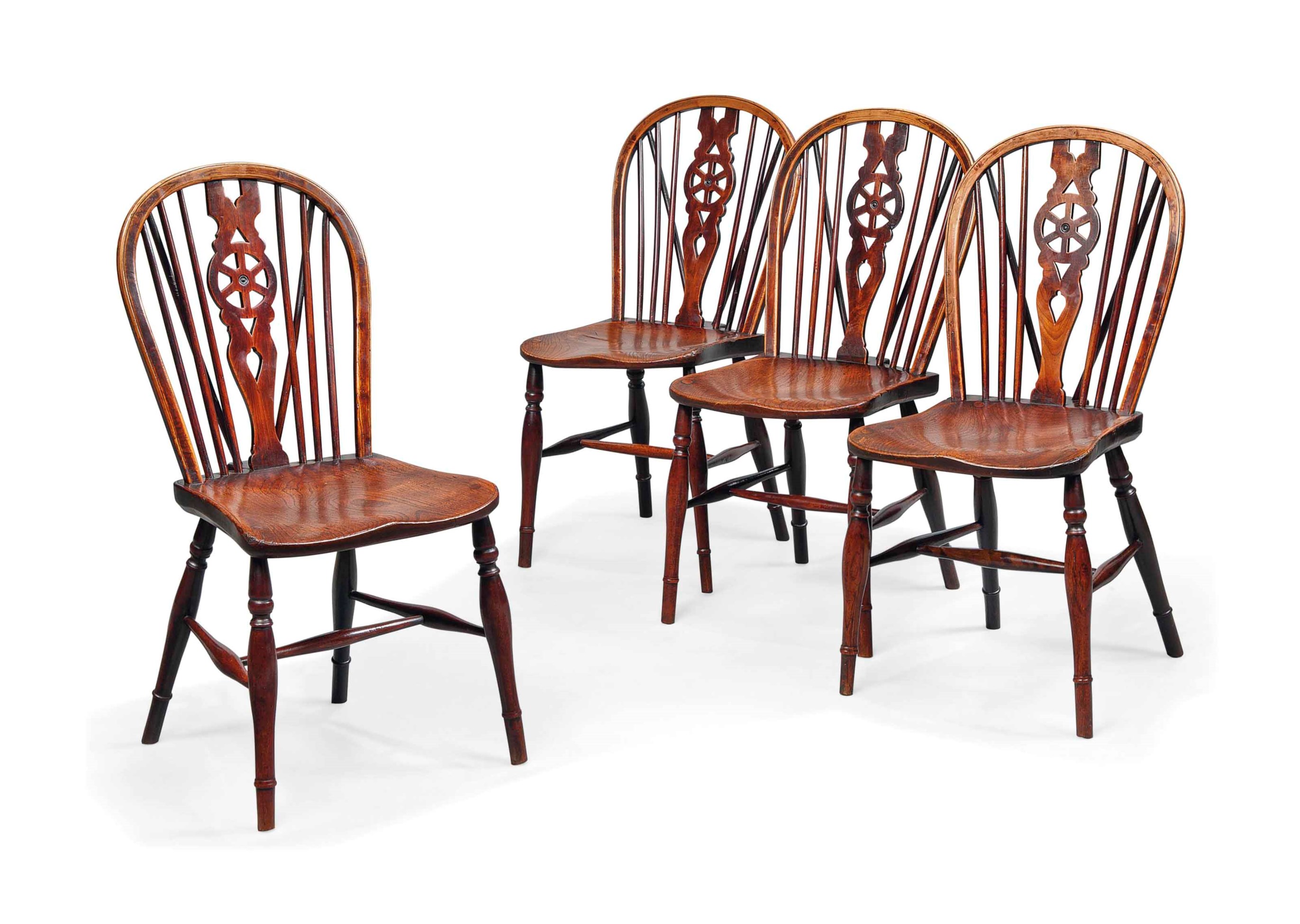 A SET OF FOUR VICTORIAN WHEELBACK WINDSOR CHAIRS