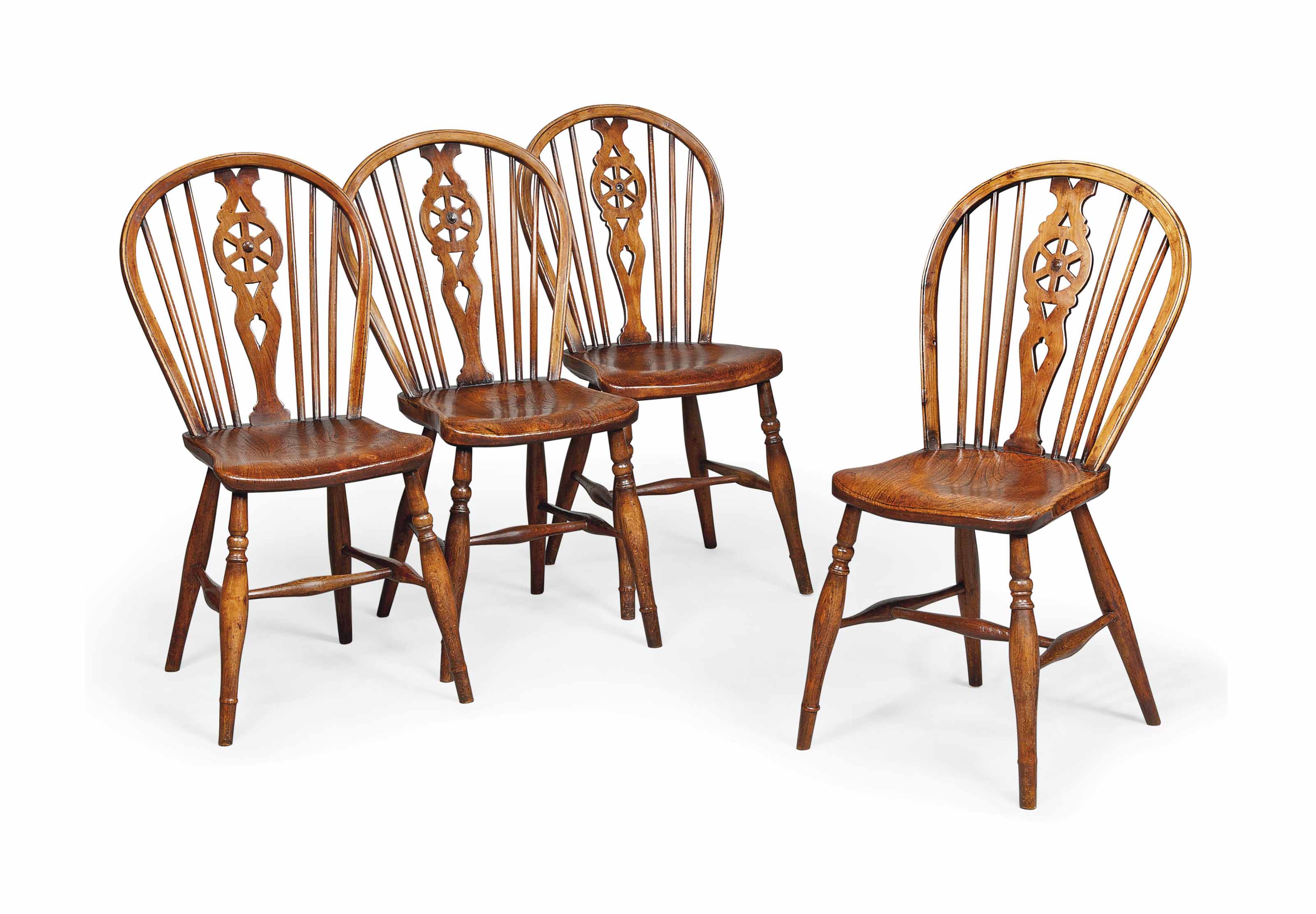 A SET OF FOUR VICTORIAN WHEELBACK WINDSOR CHAIRS , MID 19TH CENTURY