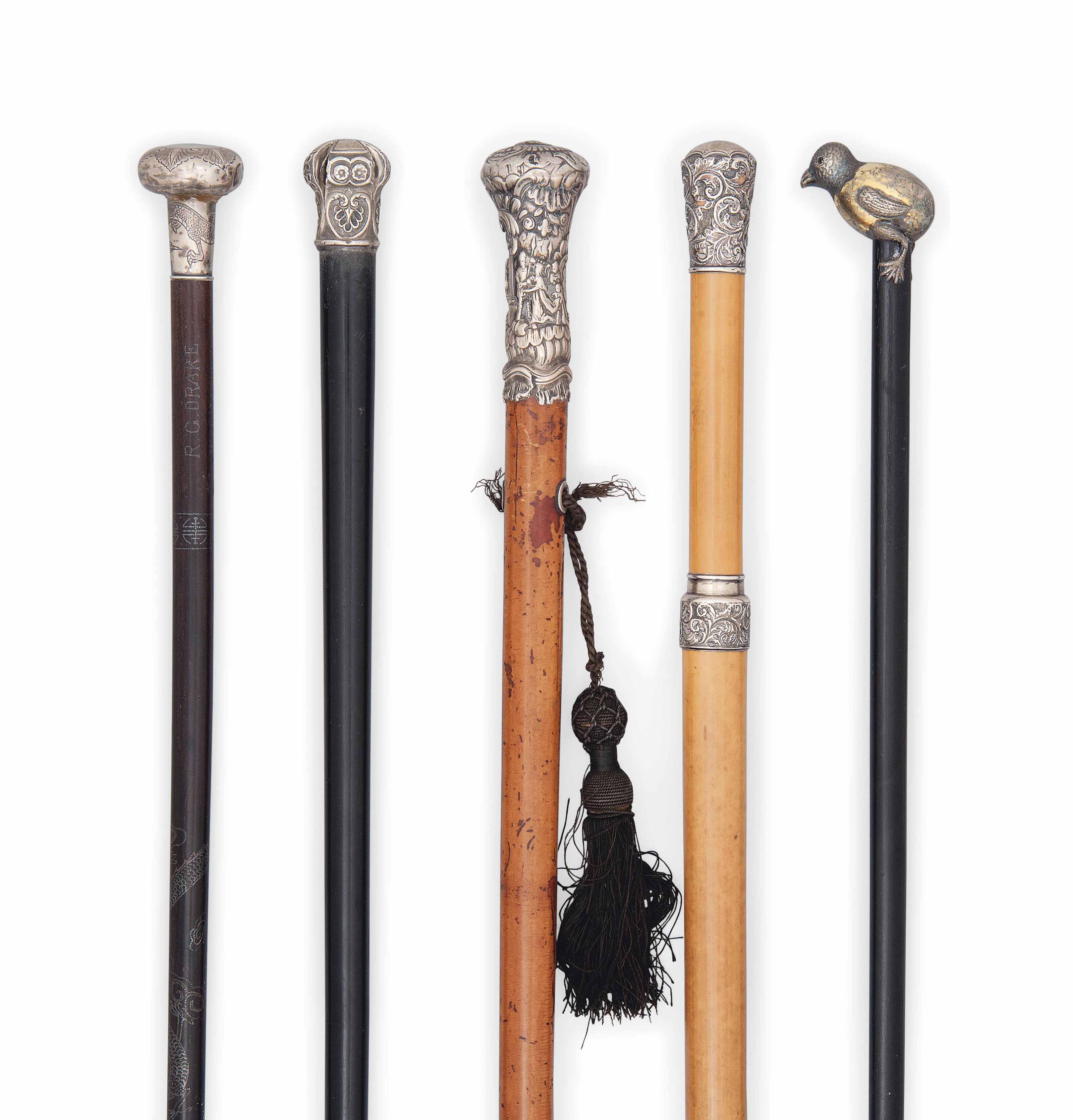 FIVE SILVERHANDLED WALKING STICKS