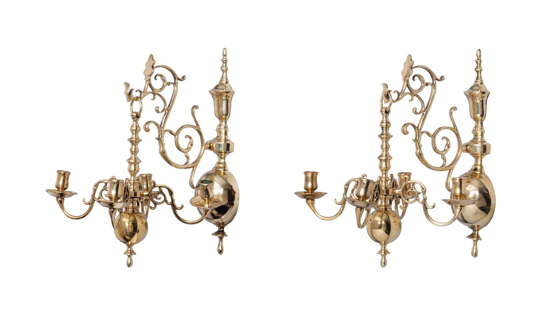 A PAIR OF BRASS WALL APPLIQUES