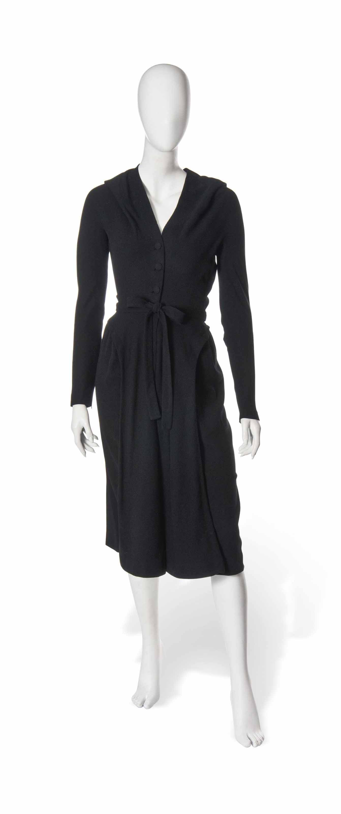 A CRISTOBAL BALENCIAGA BLACK WOOL CREPE DAY DRESS CIRCA 1950 Christie s