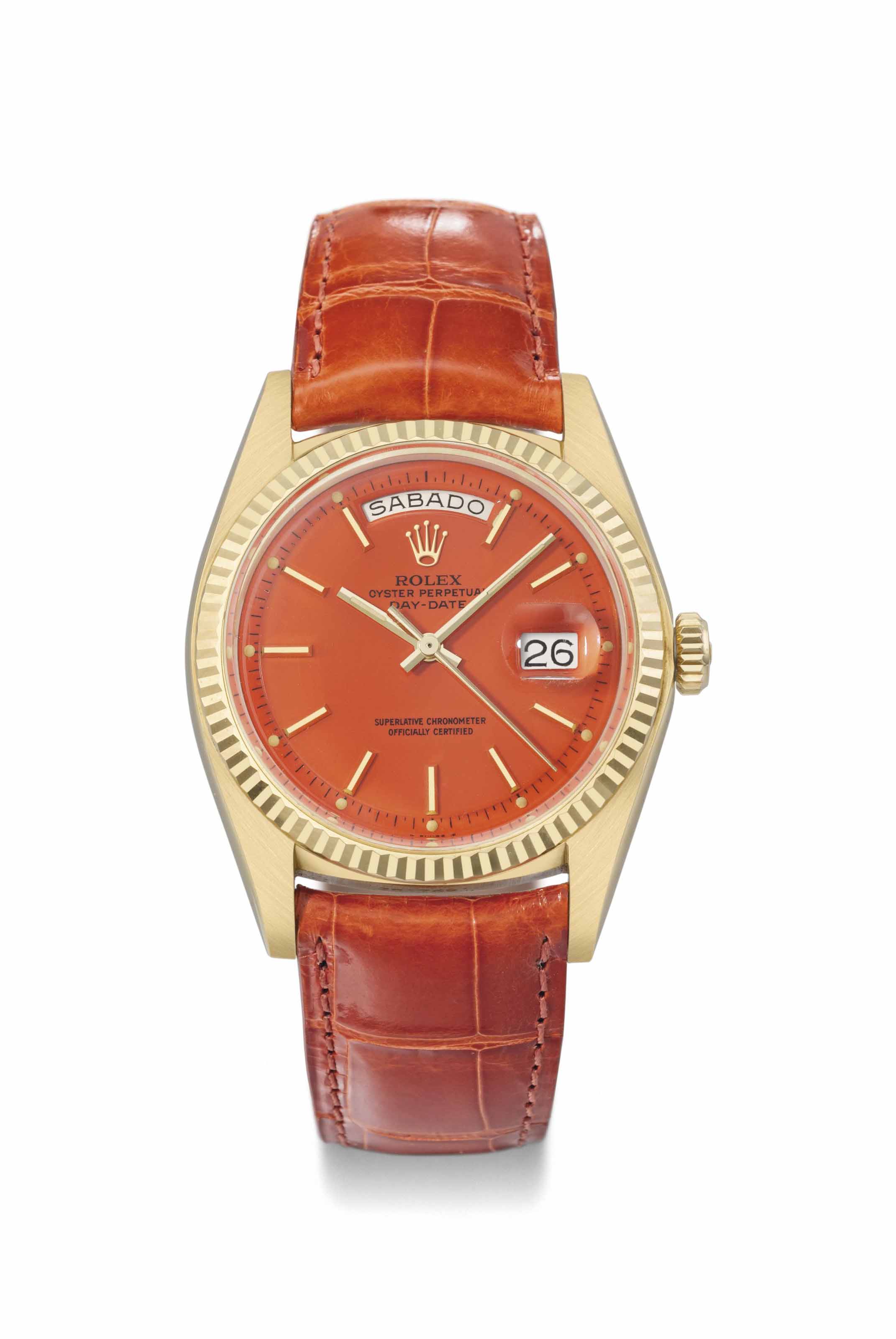 Rolex An attractive 18K gold automatic calendar wristwatch with sweep