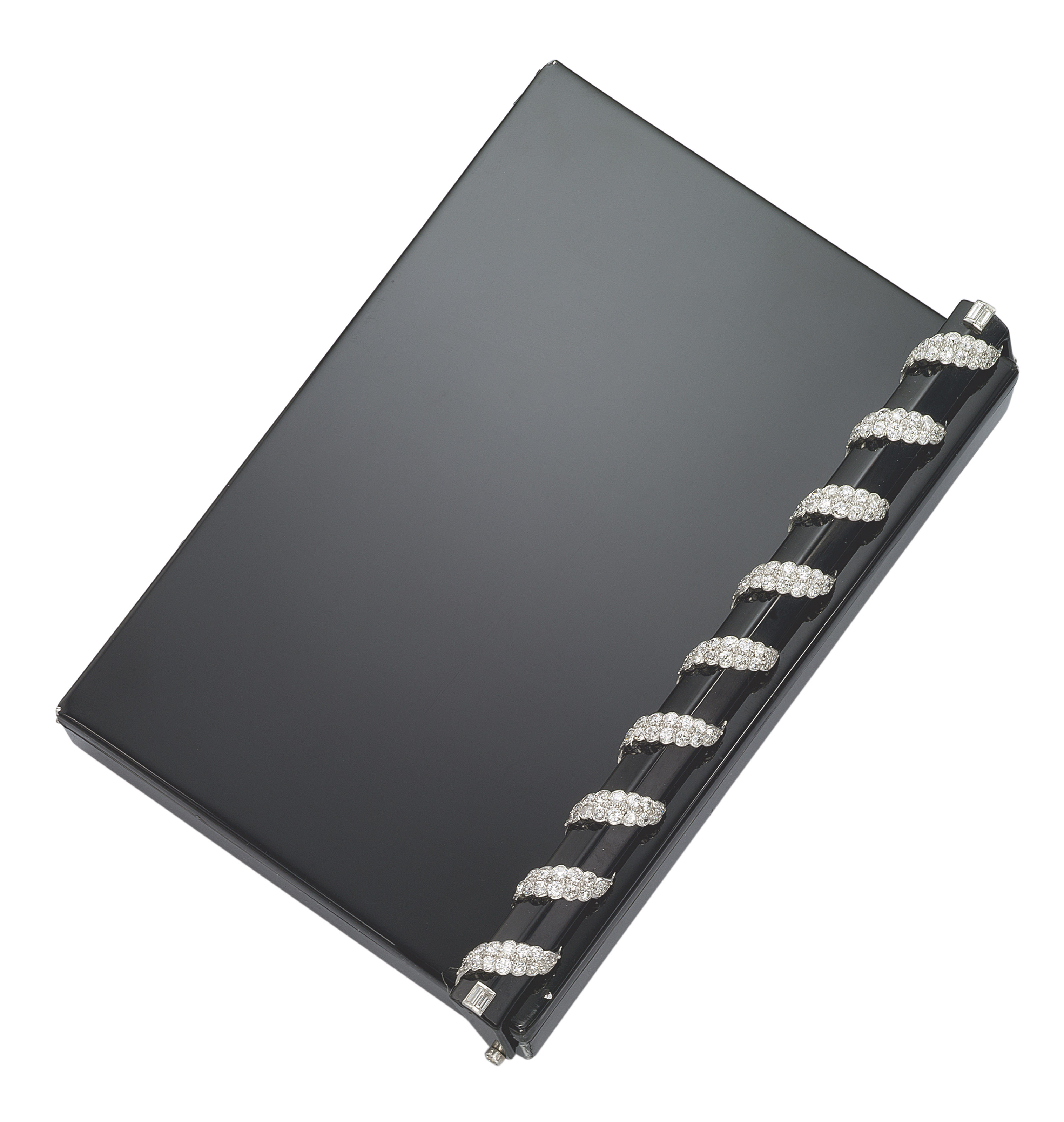 AN ART DECO LACQUER AND DIAMOND VANITY CASE, BY CARTIER Christie's