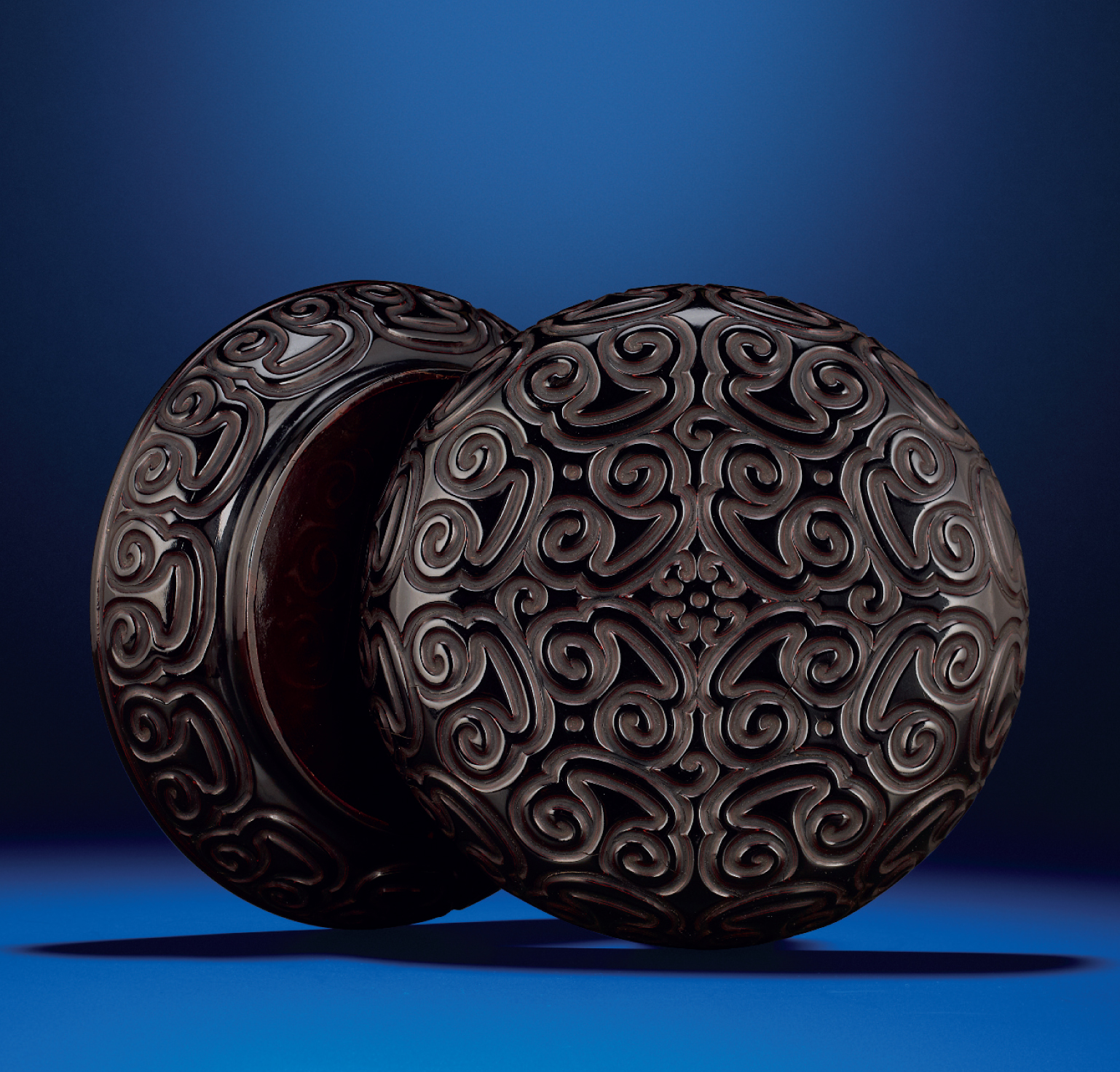 A CARVED BLACK AND RED TIXI LACQUER BOX AND COVER , MING ...