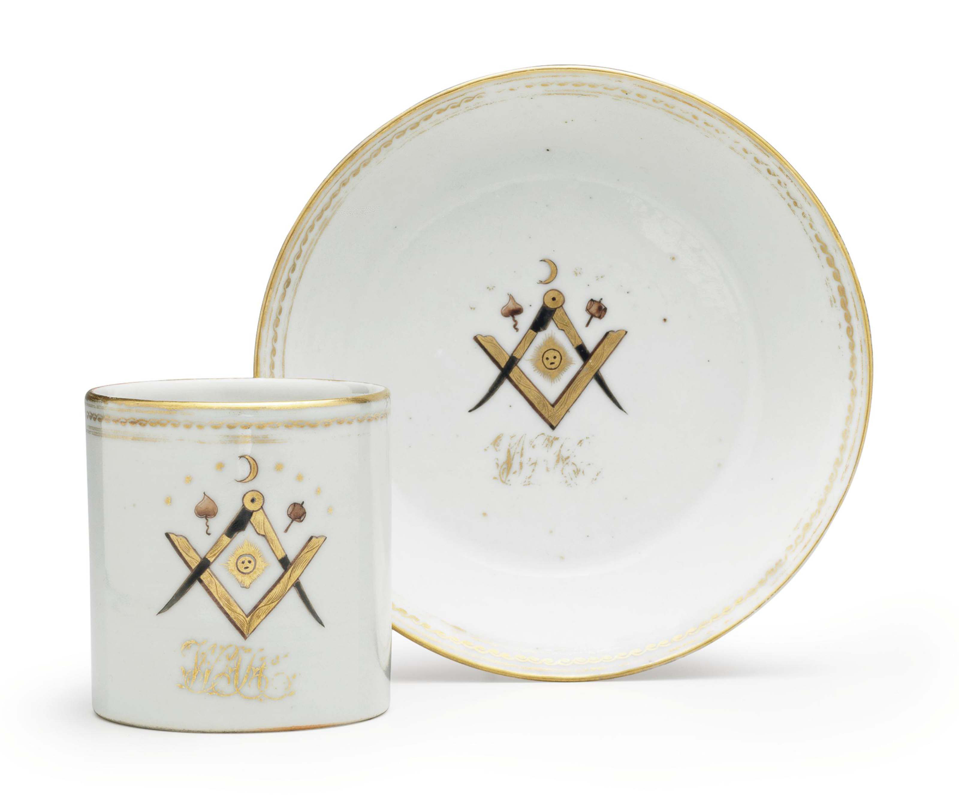 AN UNUSUAL INITIALED MASONIC COFFEE CUP AND SAUCER
