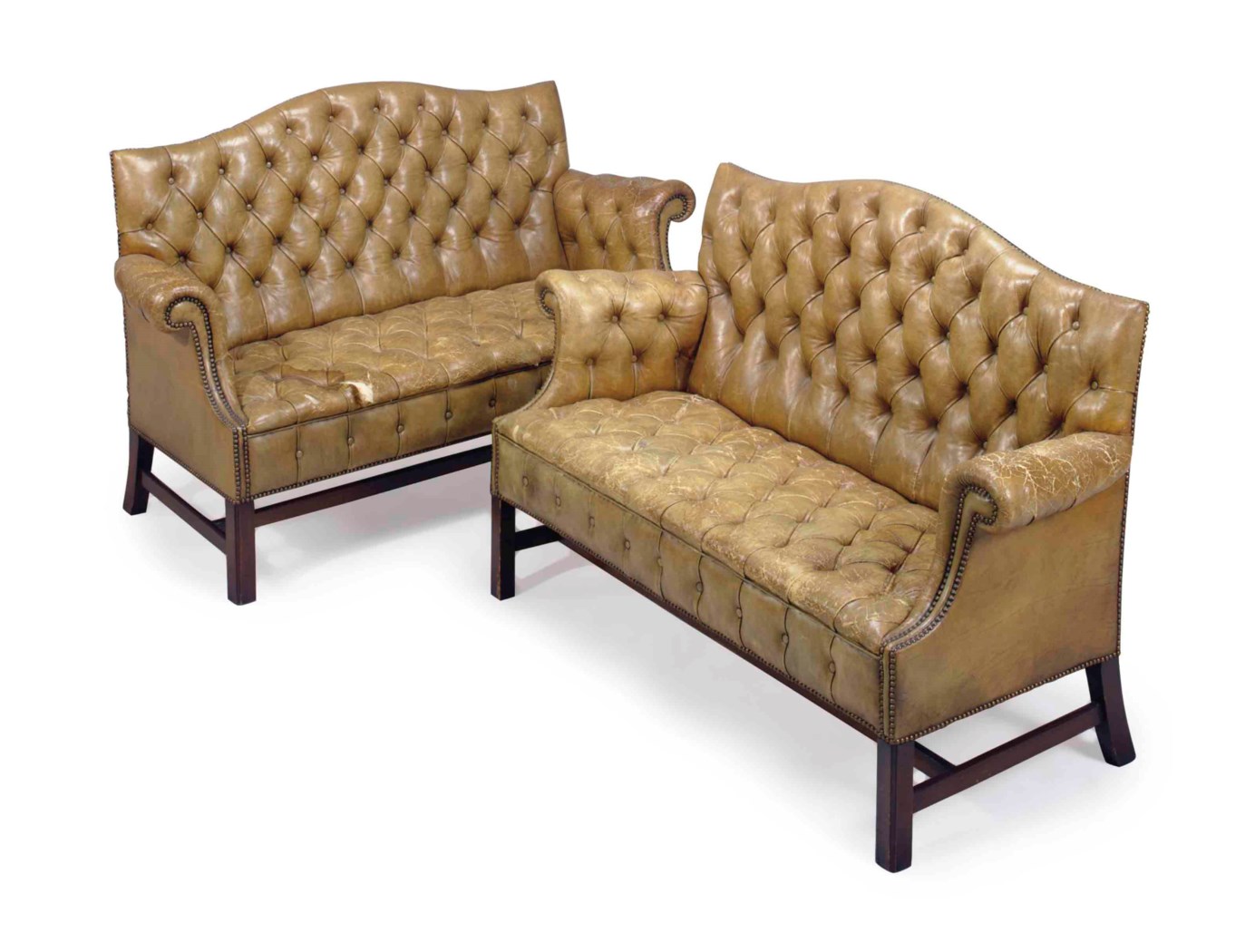 A PAIR OF ENGLISH BUTTONTUFTED LEATHER AND MAHOGANY SETTEES, , EARLY