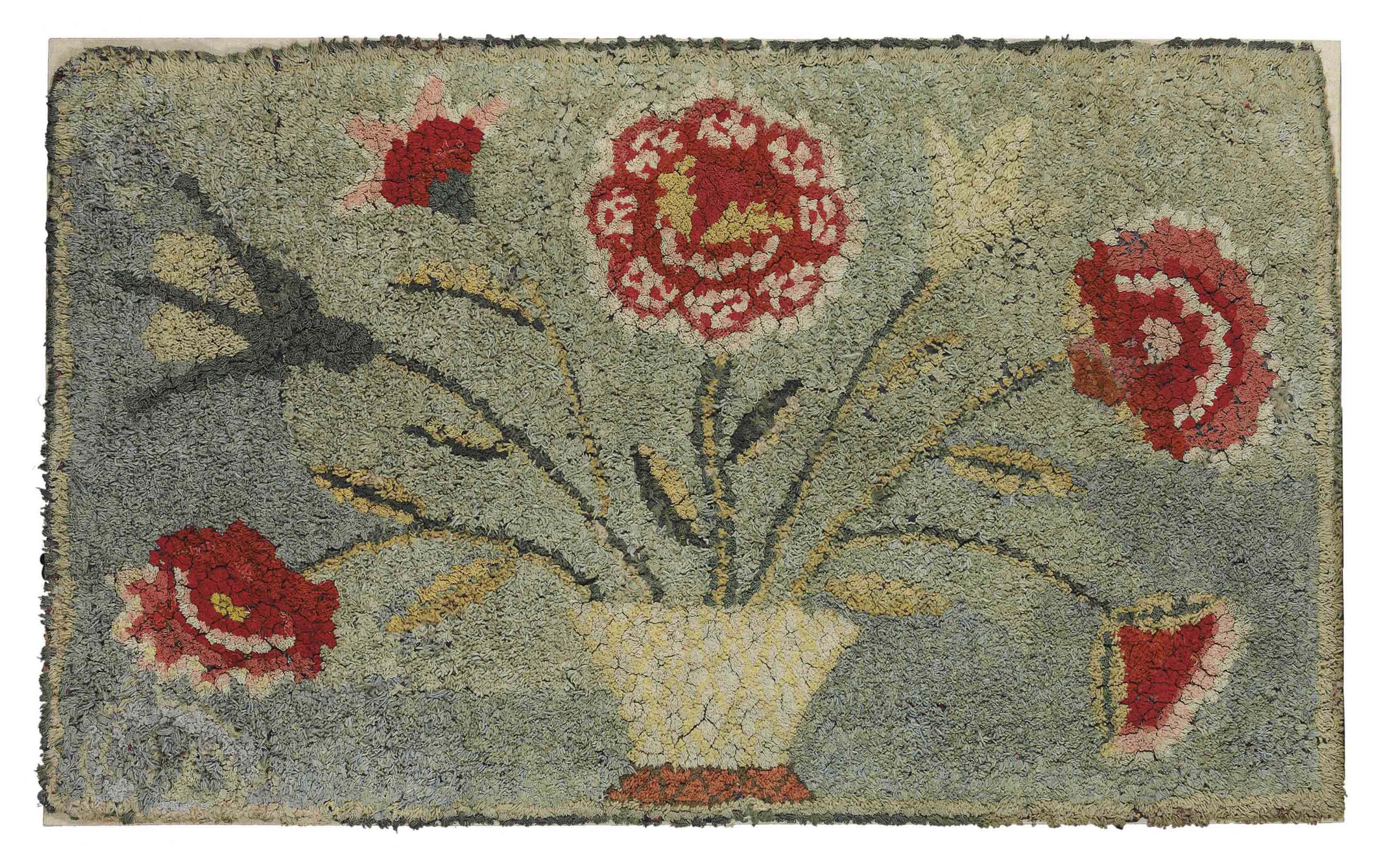 A FLORAL HOOKED RUG , AMERICAN, CIRCA 1830 Christie's