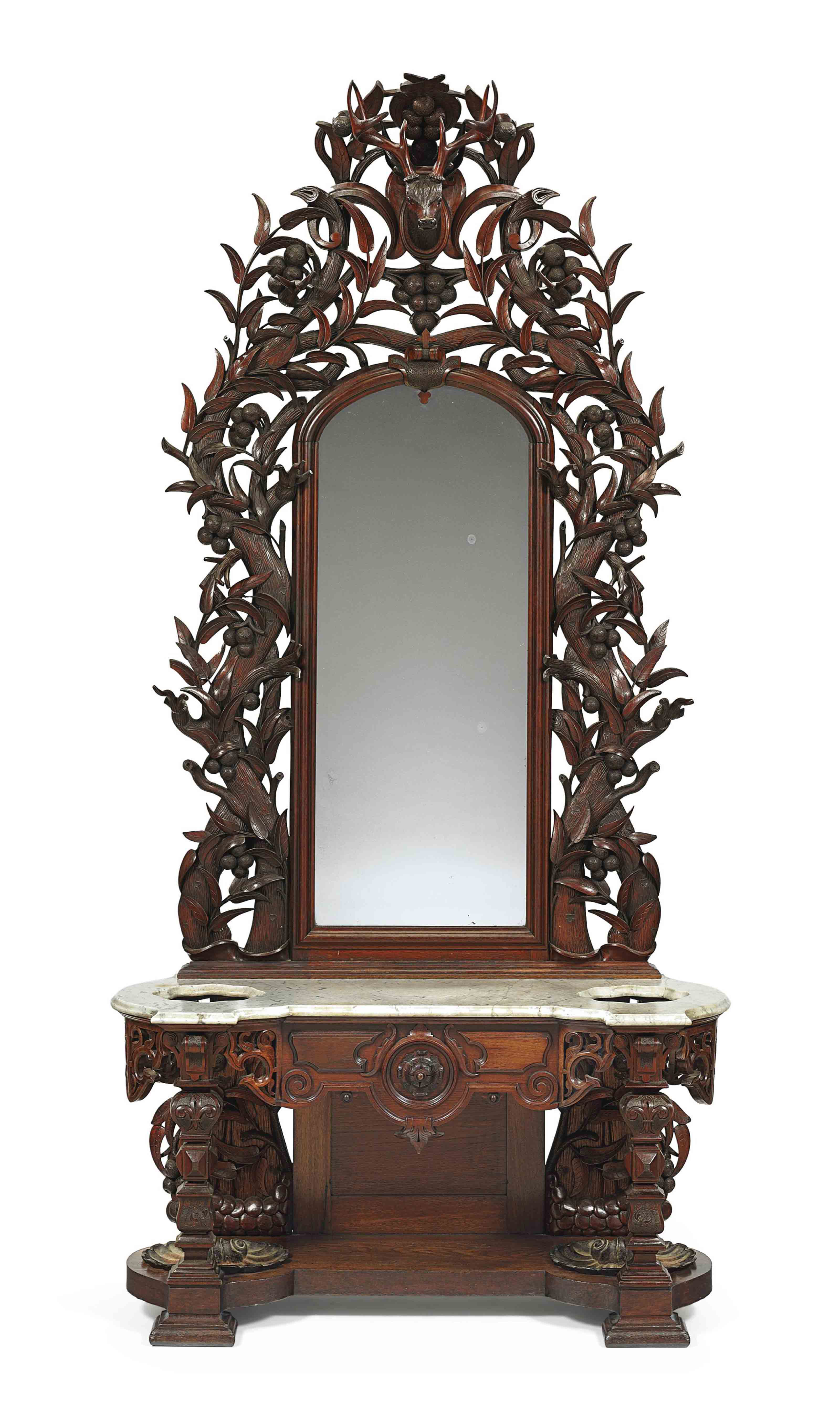 A VICTORIAN CARVED WALNUT HALL TREE , ATTRIBUTED TO MITCHELL AND