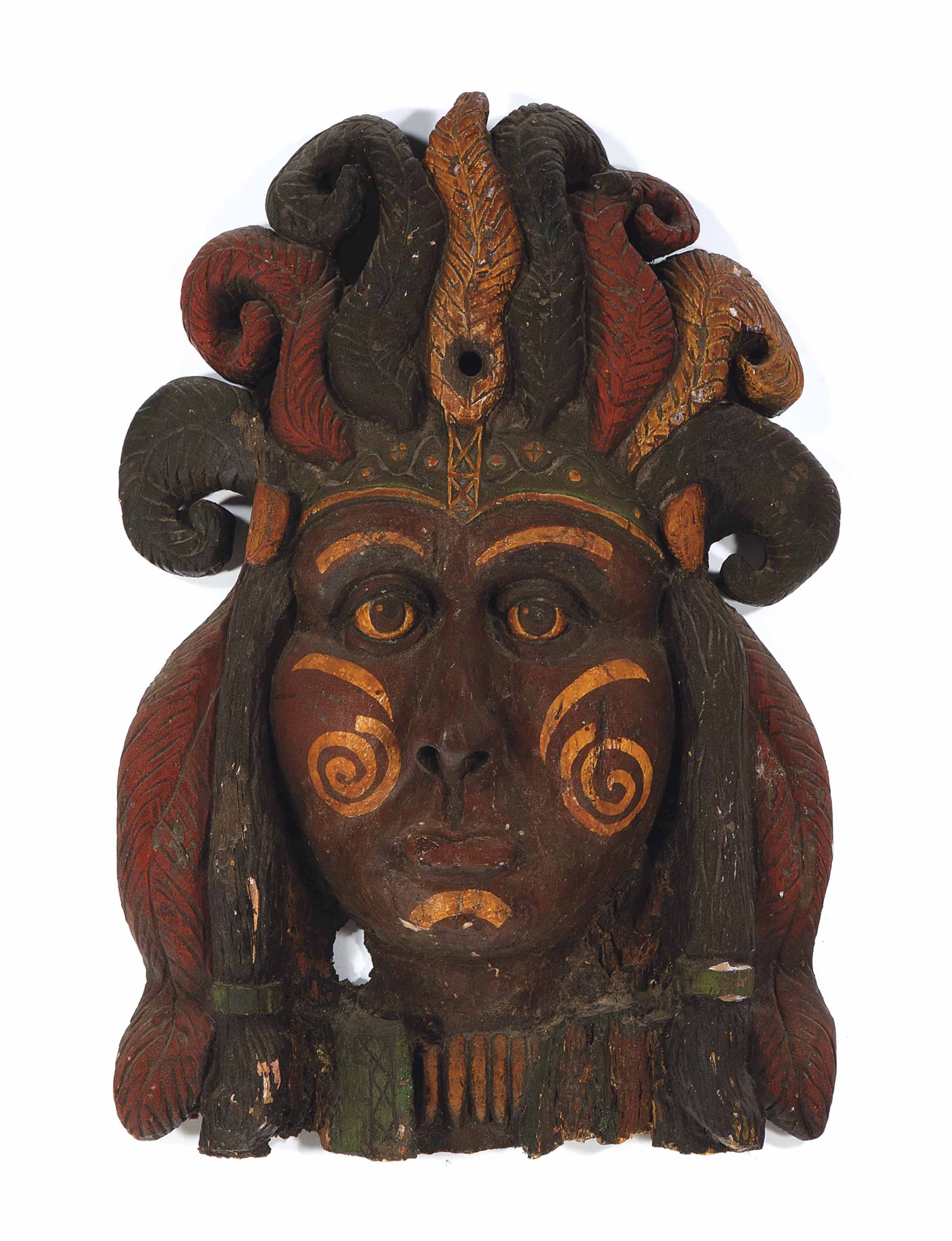 A LARGE AMERICAN CARVED AND PAINTED WOOD MASK OF A NATIVE AMERICAN