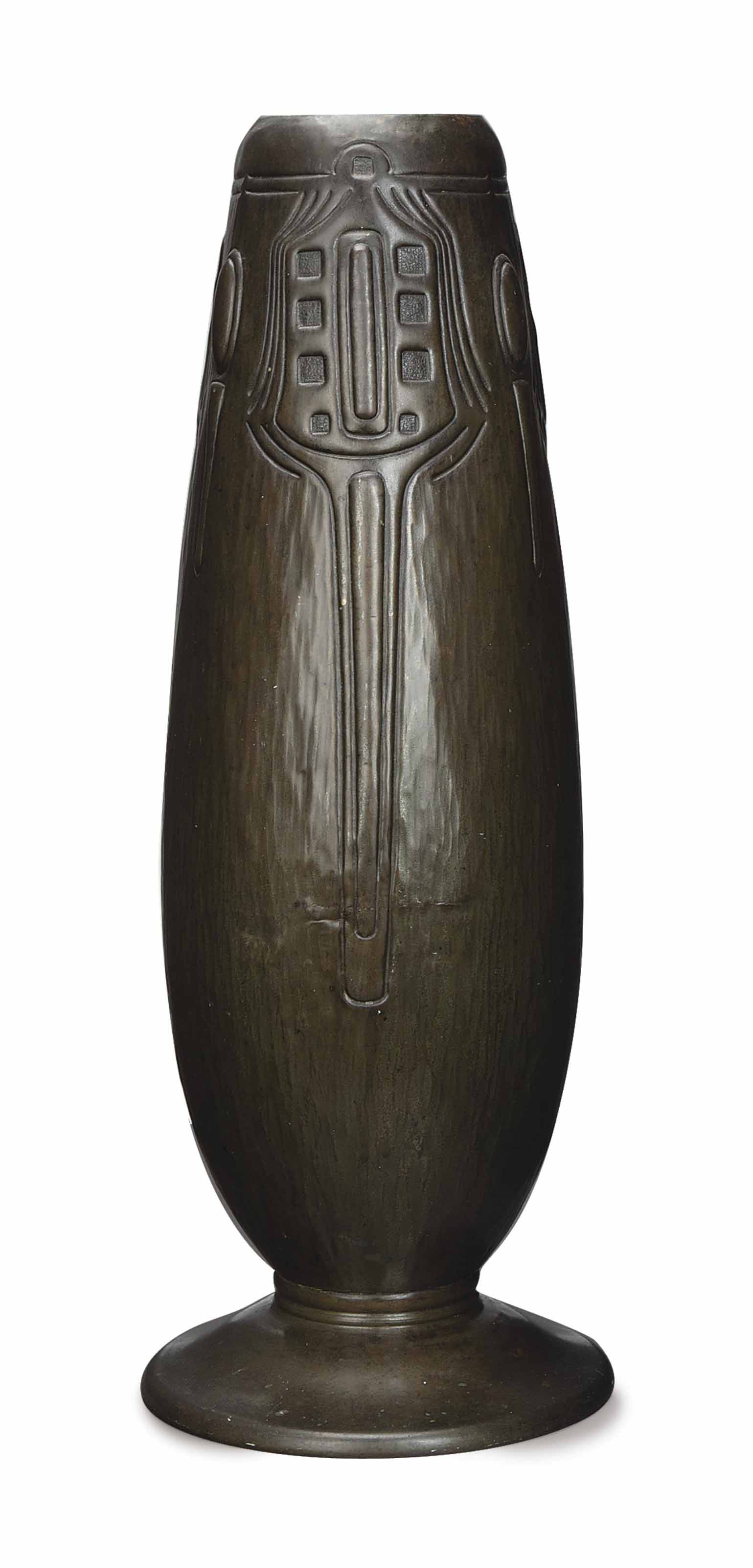 AN ART DECO HAMMEREDMETAL VASE, , SECOND QUARTER 20TH CENTURY Christie's
