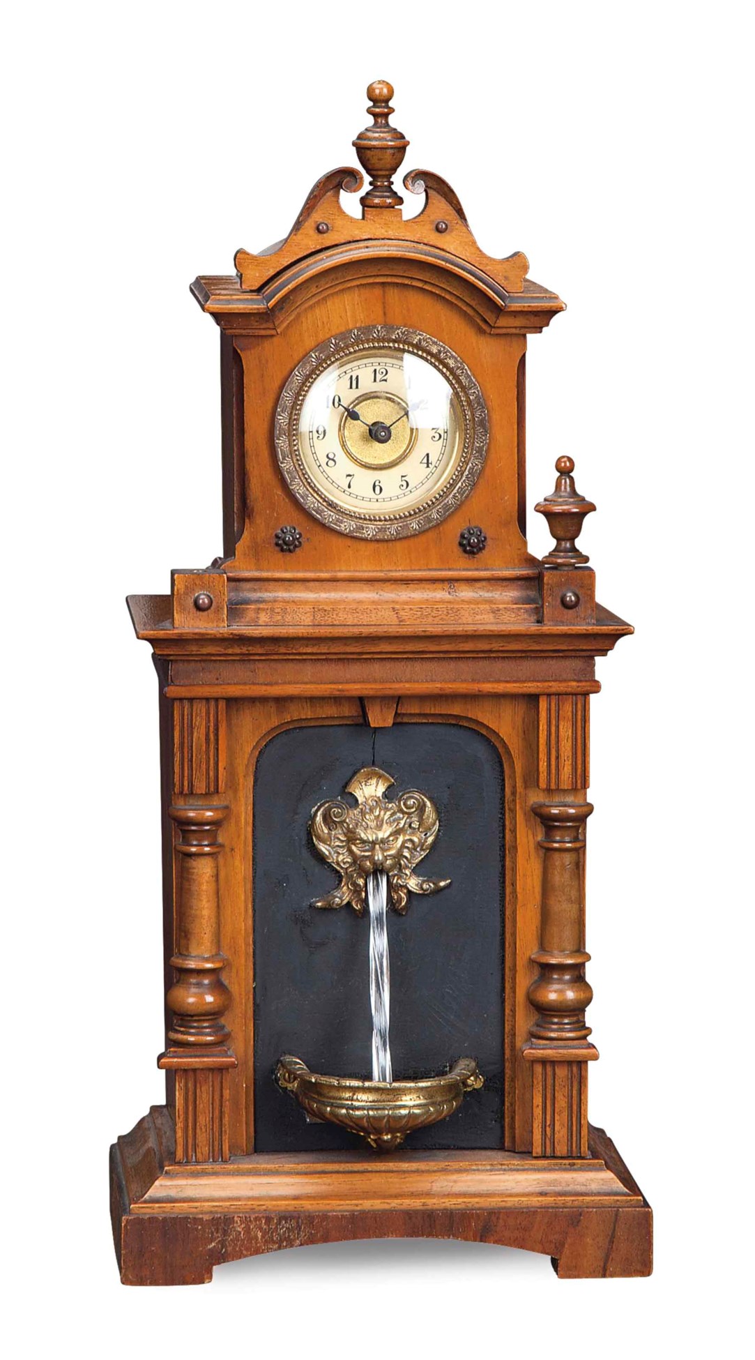 A BRASSMOUNTED WALNUT FOUNTAIN CLOCK, , EARLY 20TH CENTURY Christie's