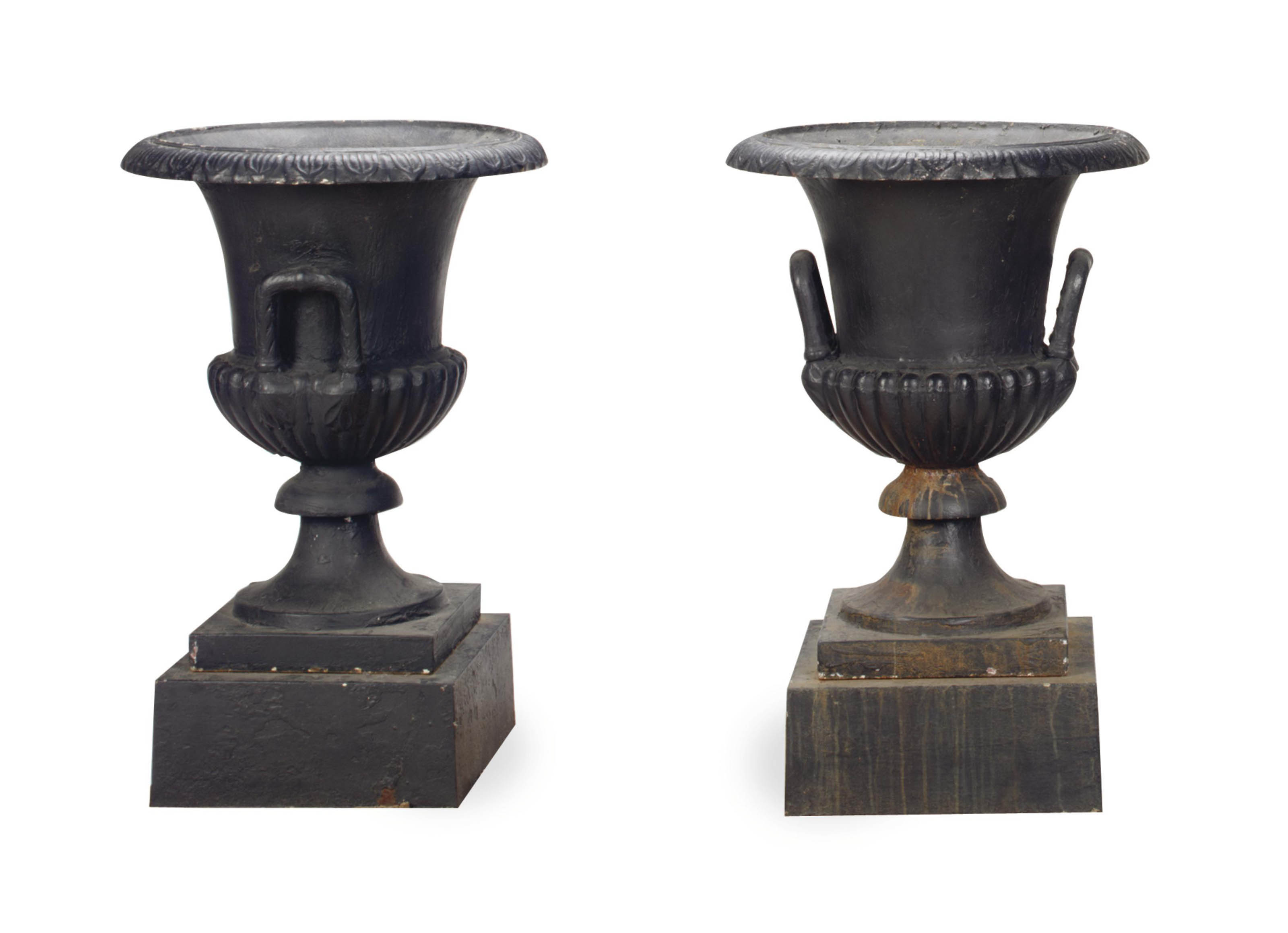 A PAIR OF LARGE BLACKPAINTED CASTIRON GARDEN URNS,