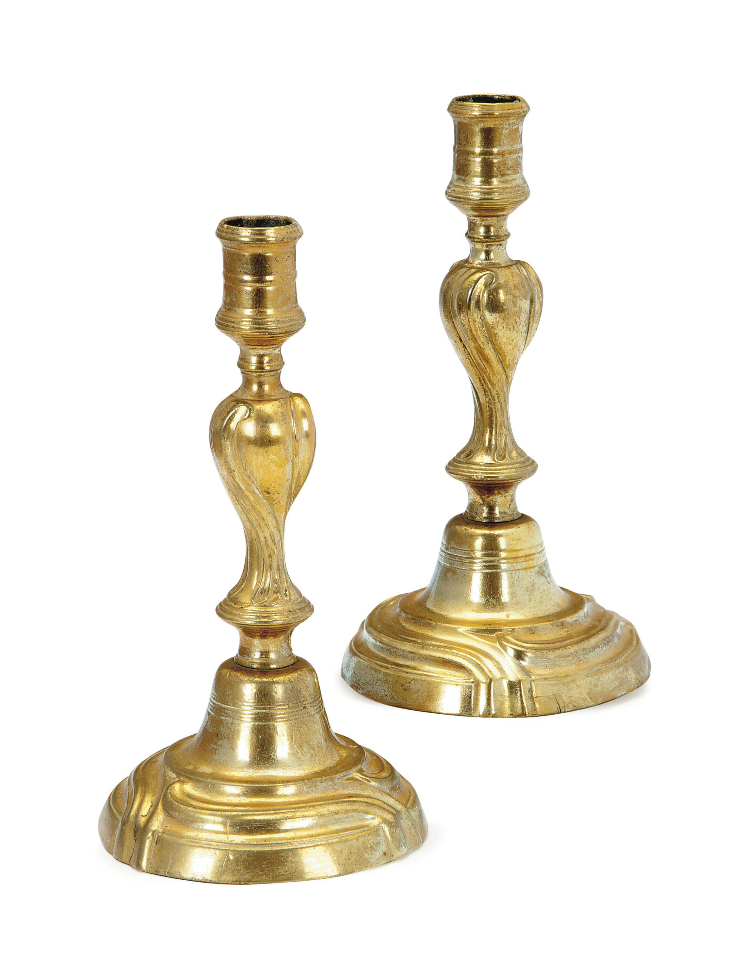 A PAIR OF FRENCH BRASS CANDLESTICKS, , 19TH/20TH CENTURY Christie's