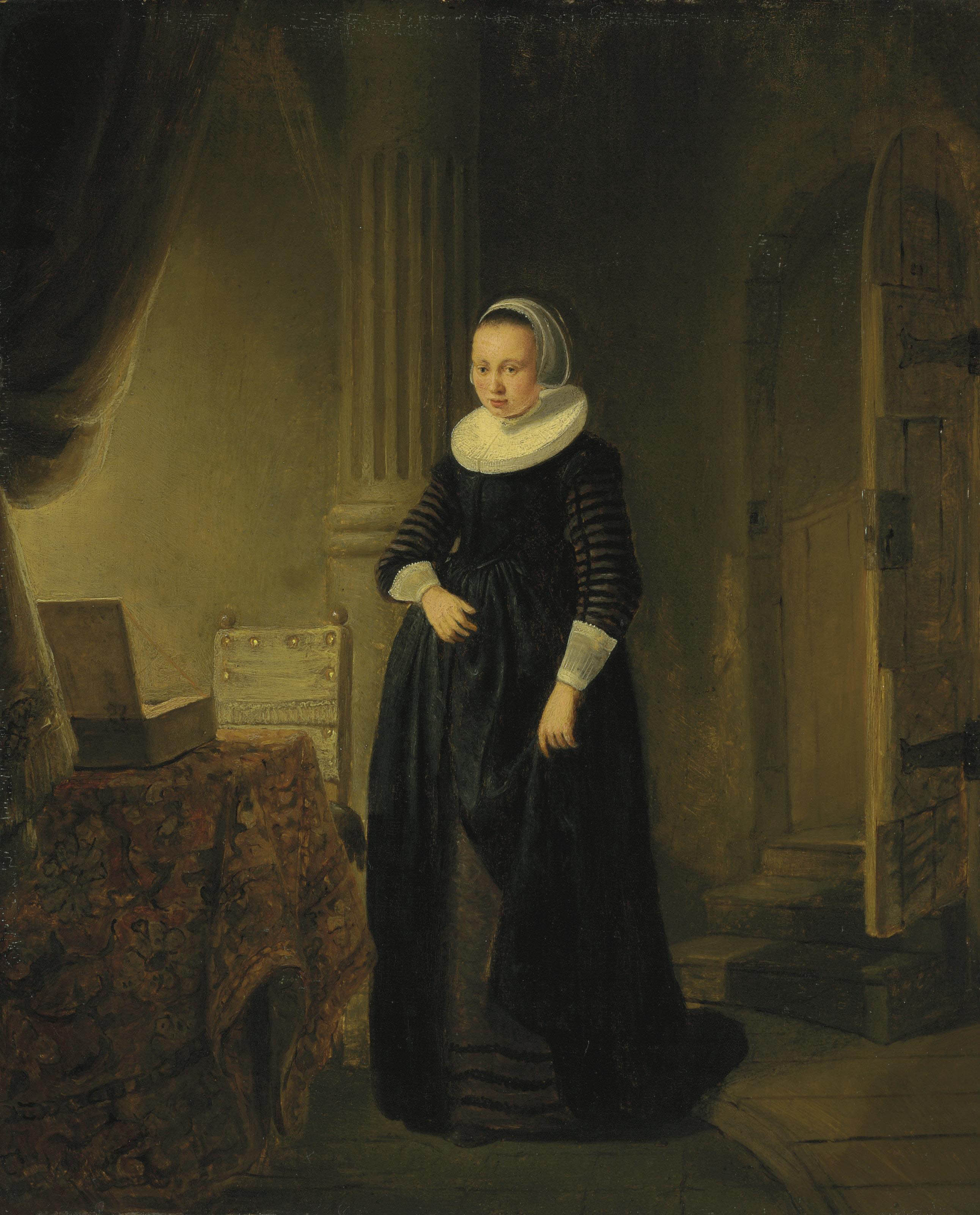 A young woman in an interior 
