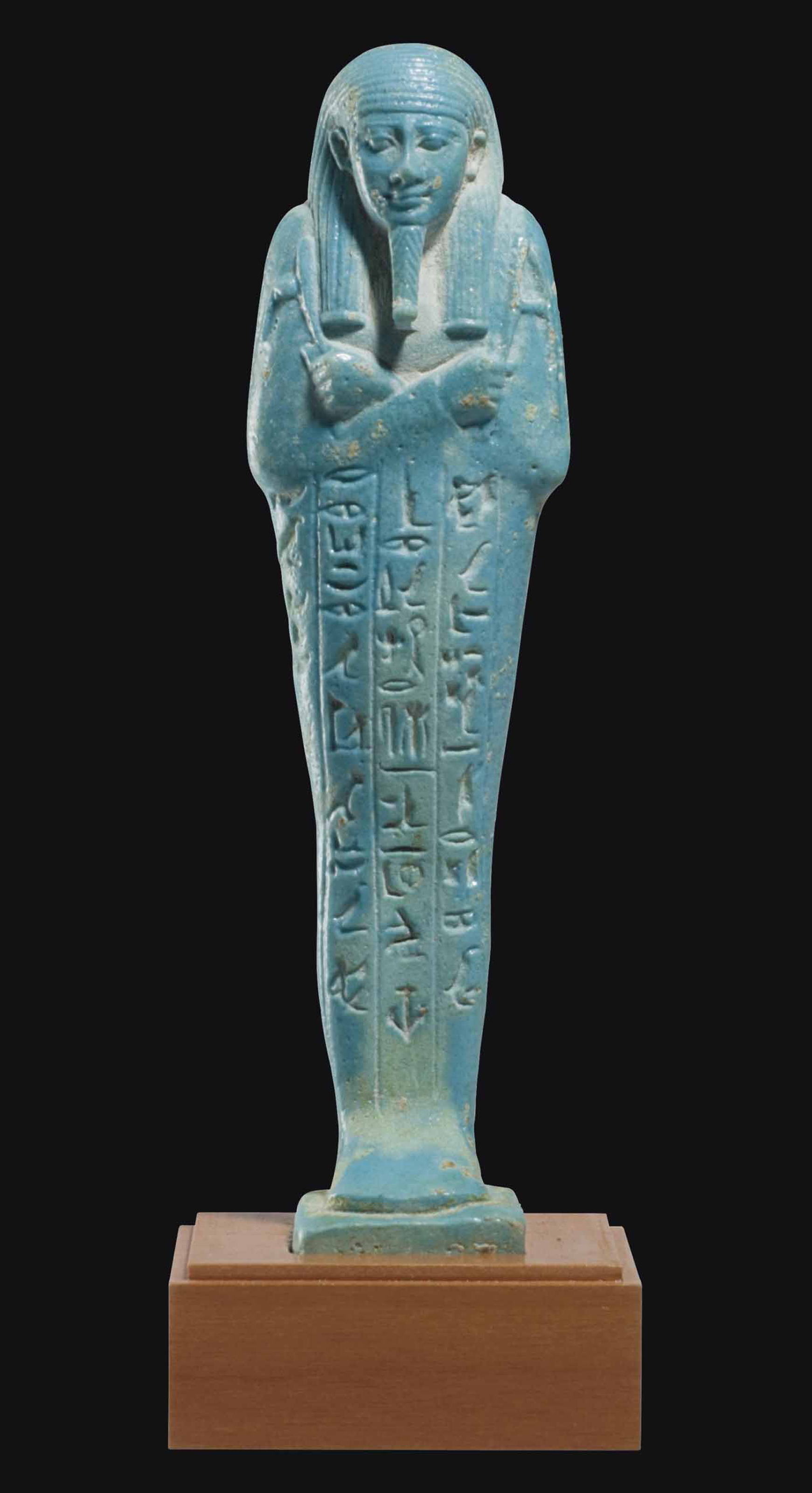 AN EGYPTIAN FAIENCE SHABTI FOR WEDJAHOR , LATE PERIOD, DYNASTY XXVI