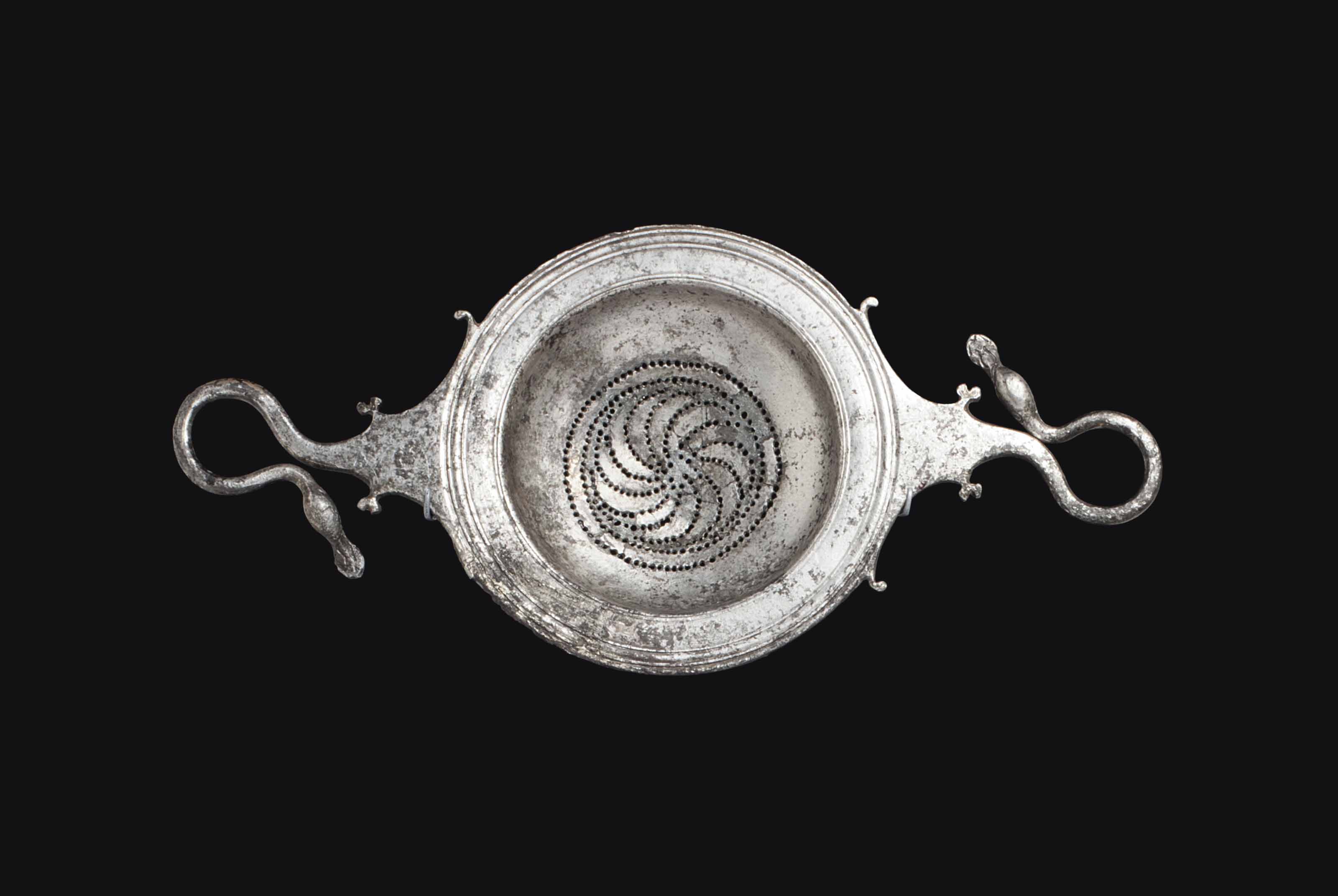 A GREEK SILVER STRAINER , LATE CLASSICAL TO EARLY HELLENISTIC PERIOD