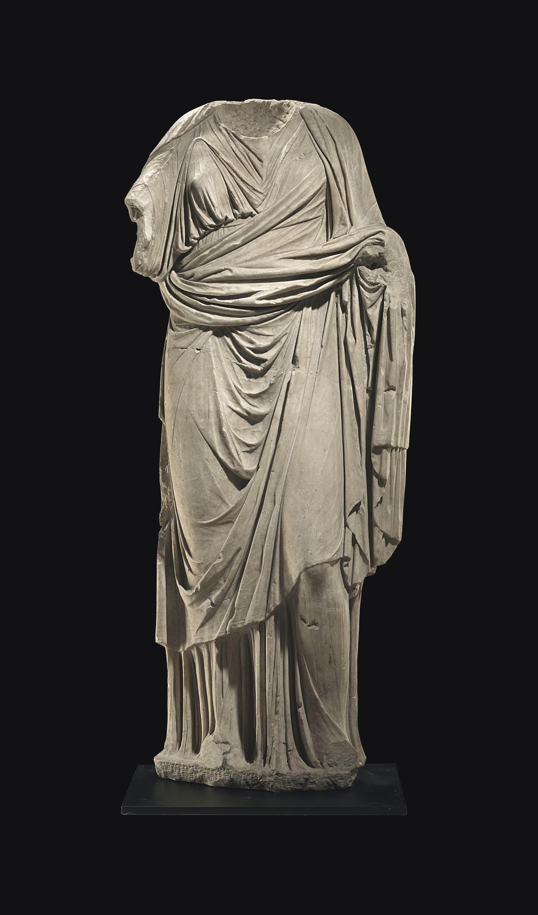 A ROMAN MARBLE DRAPED FEMALE FIGURE , CIRCA 2ND CENTURY A.D. Christie's