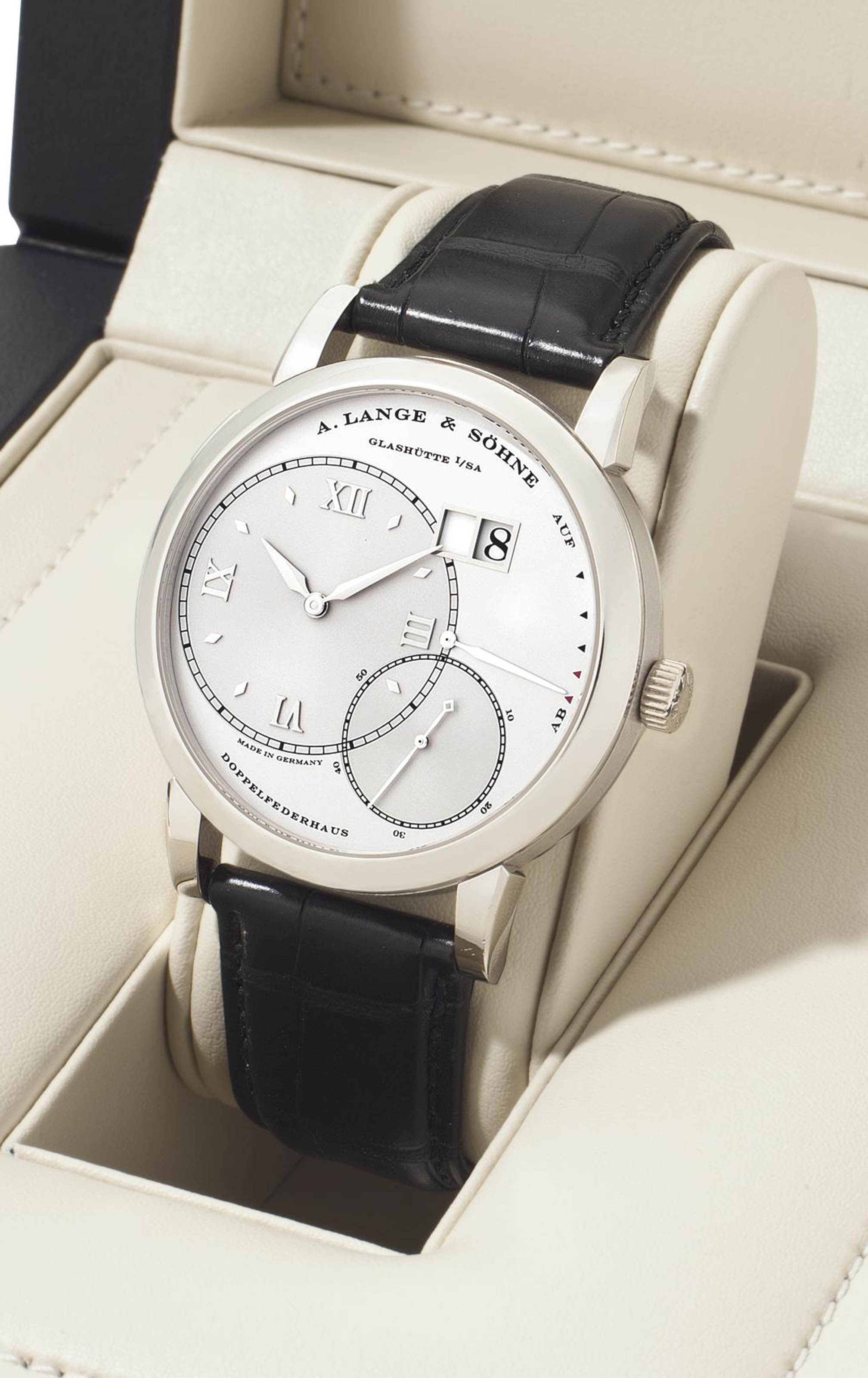 A. Lange & Söhne. A Fine Large Platinum Twin Barrel Wristwatch with Oversized Date and Power