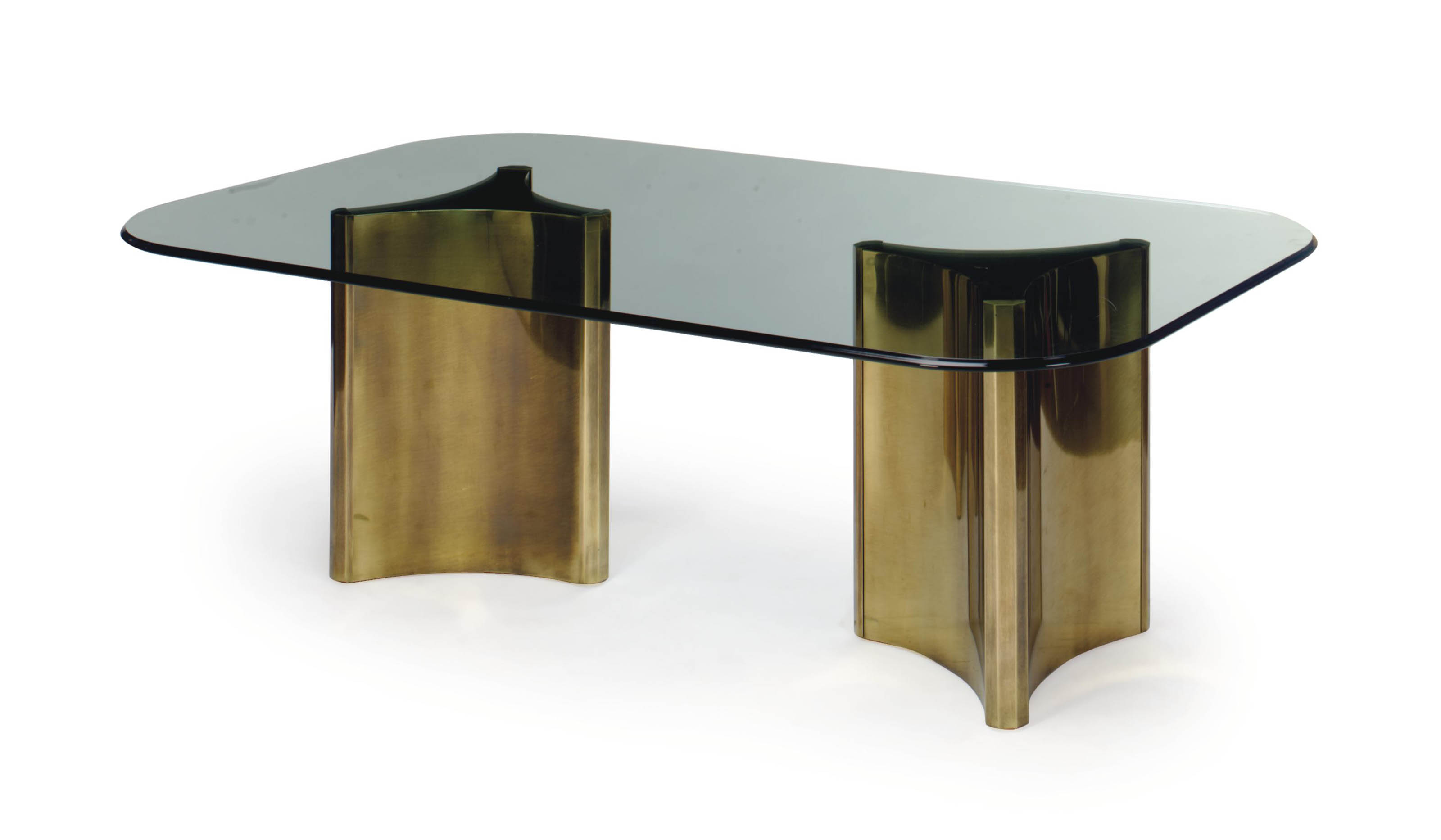 A CONTEMPORARY BRASS AND GLASS DINING TABLE,