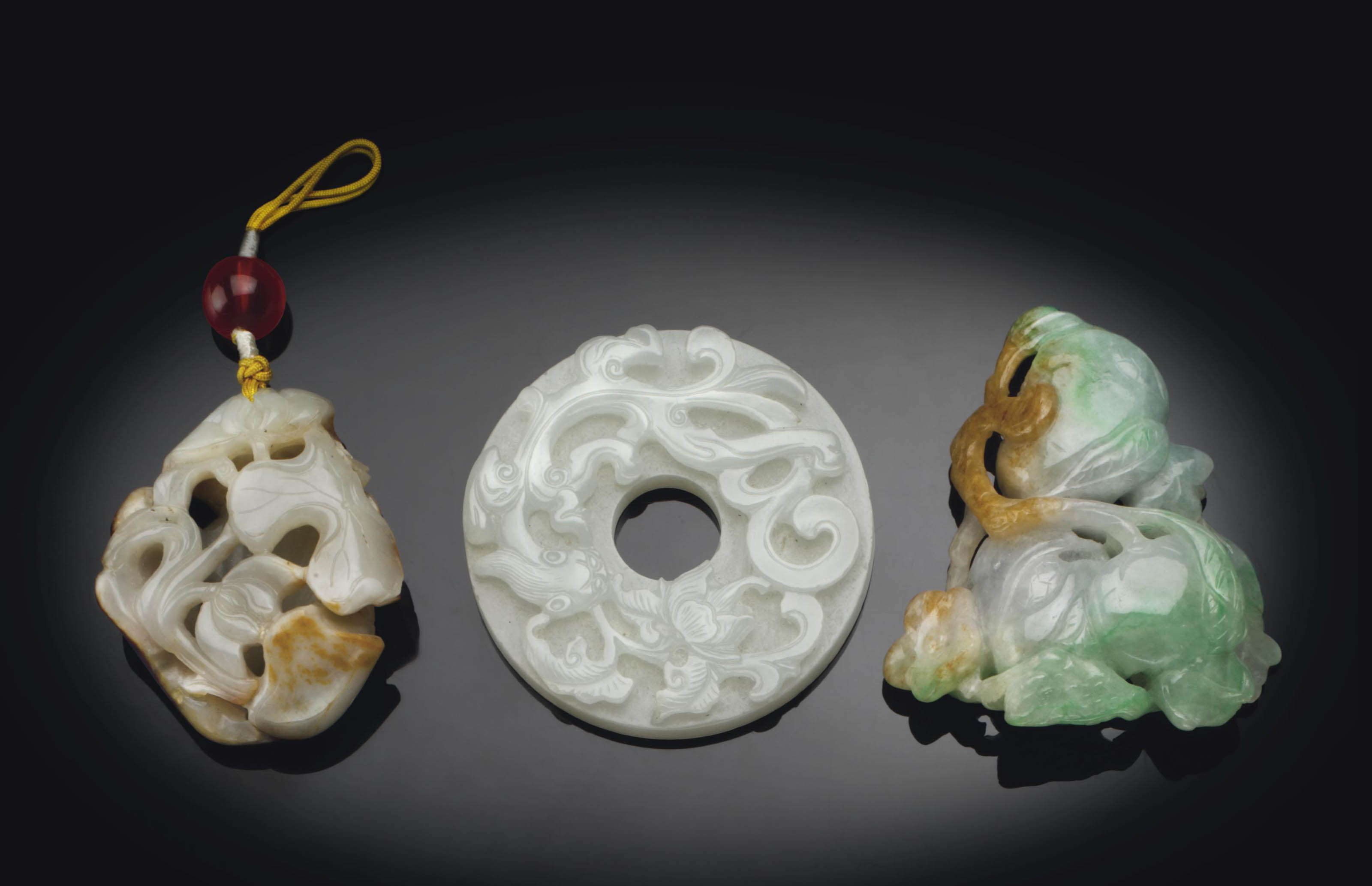 THREE SMALL JADE AND JADEITE CARVINGS Christie's