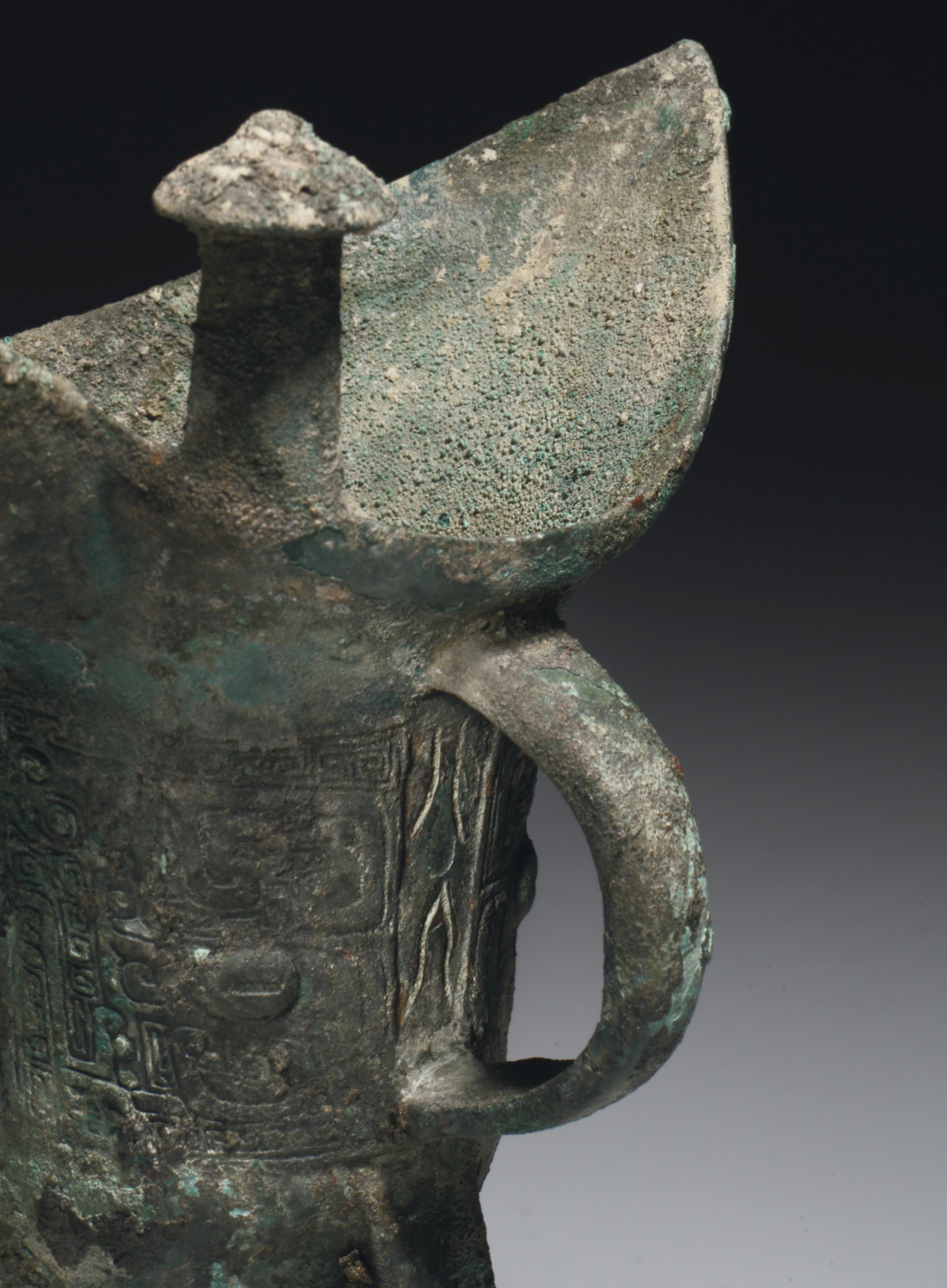 A BRONZE TRIPOD RITUAL WINE VESSEL, JUE , LATE SHANG DYNASTY, 11TH CENTURY BC Christie's