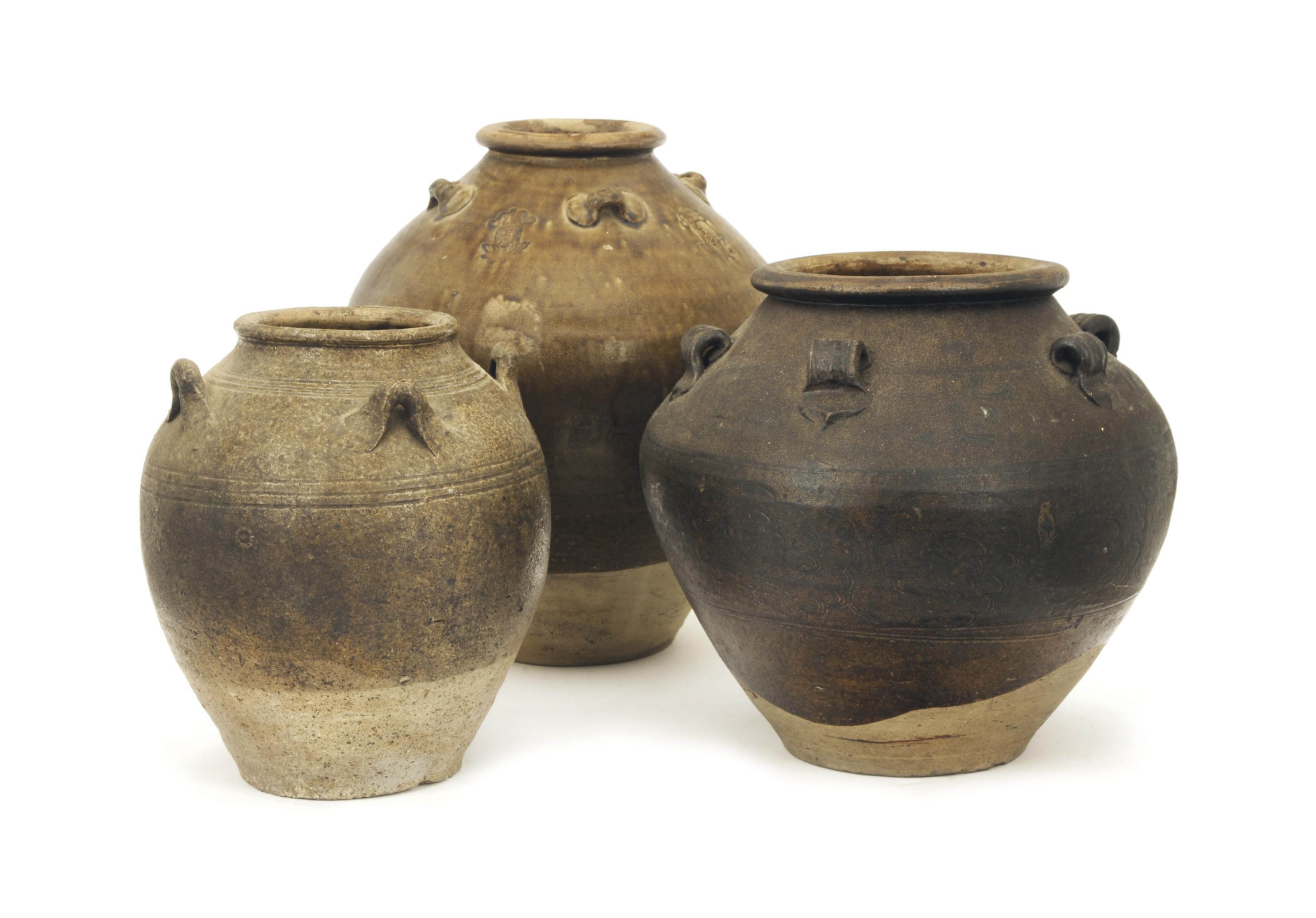 THREE BROWNGLAZED POTTERY JARS WITH LUG HANDLES Christie's