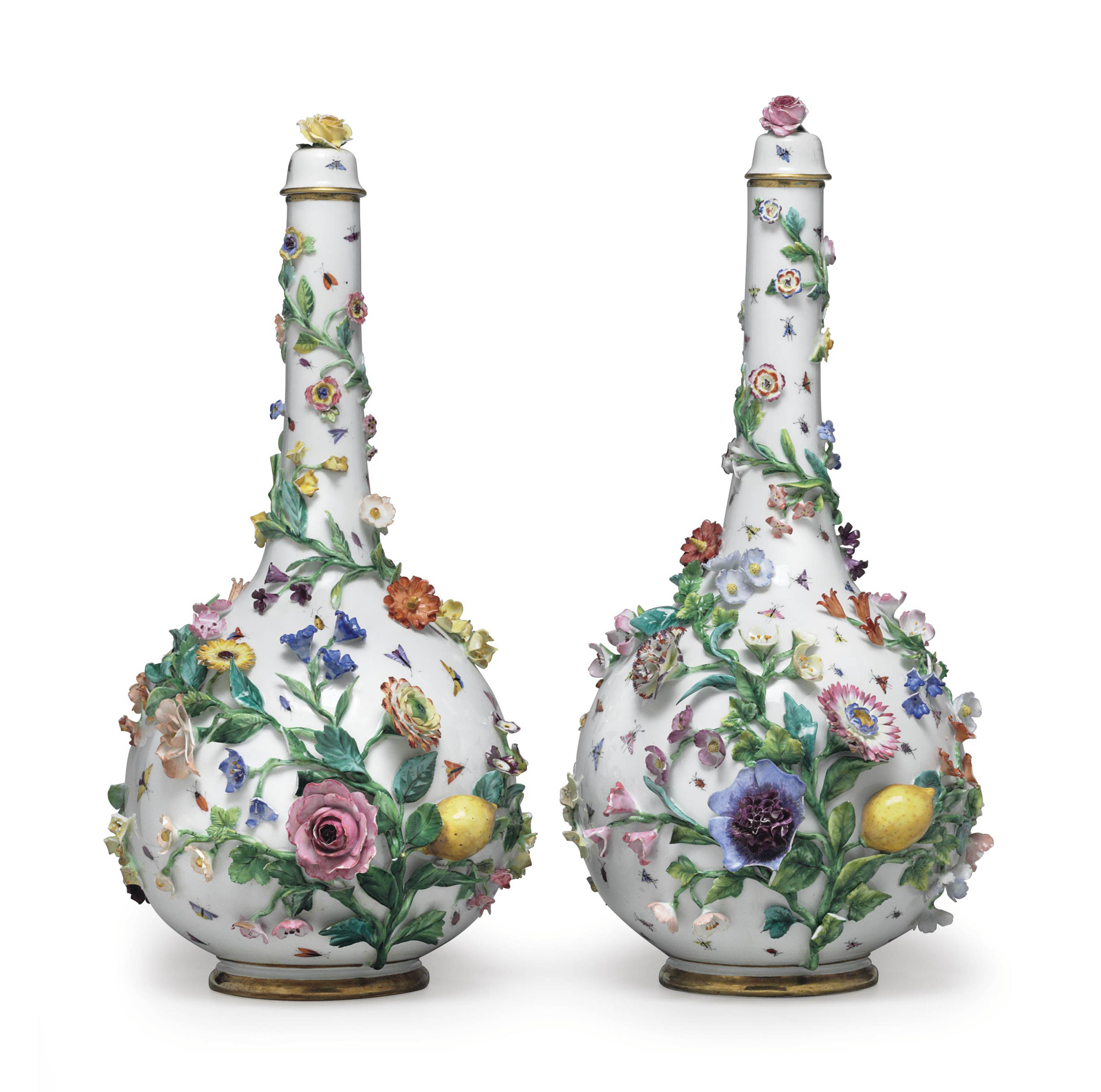 A PAIR OF MEISSEN PORCELAIN FRUIT AND FLOWER ENCRUSTED VASES AND COVERS