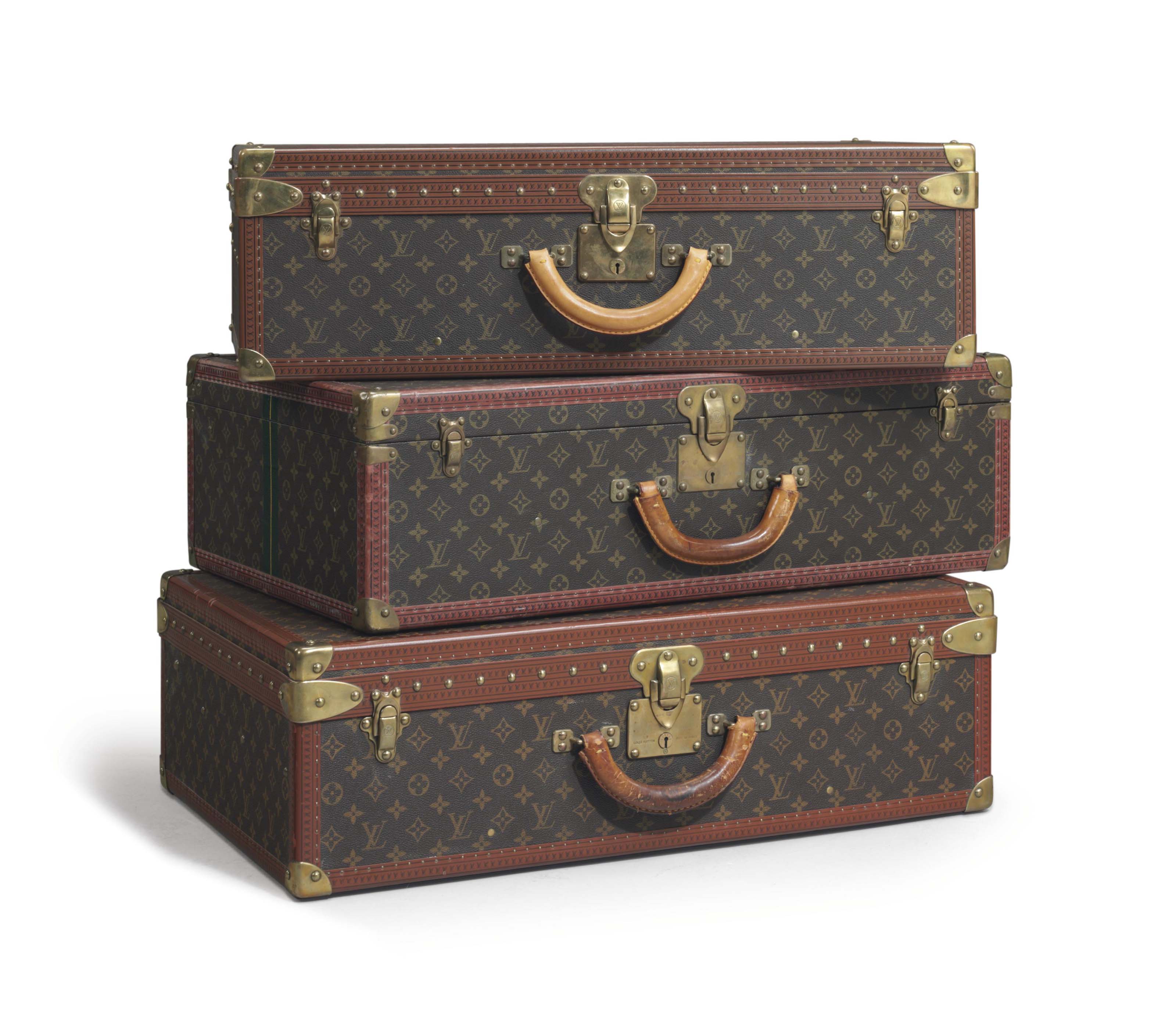 A SET OF THREE LOUIS VUITTON SUITCASES
