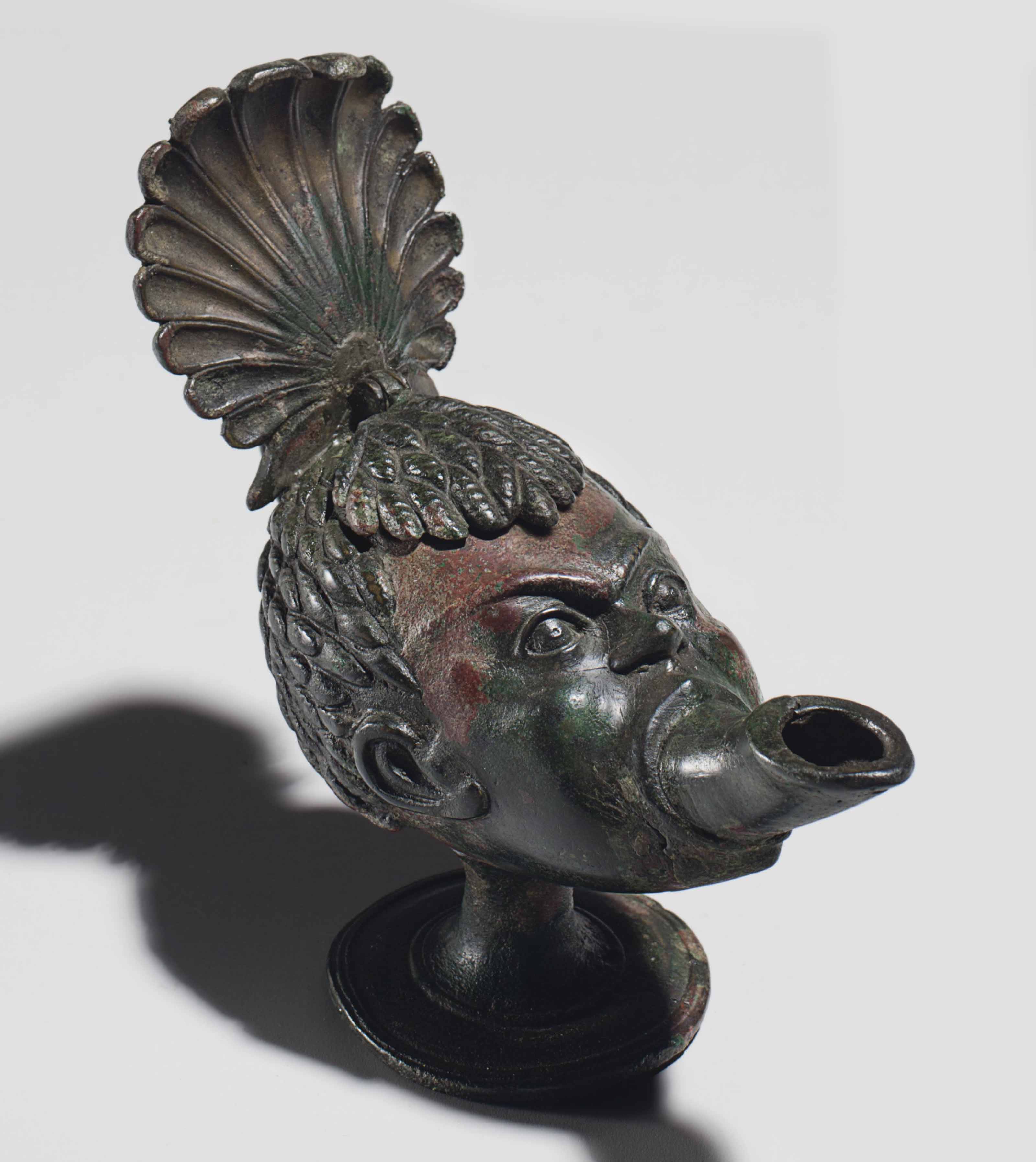 A Roman Bronze Oil Lamp