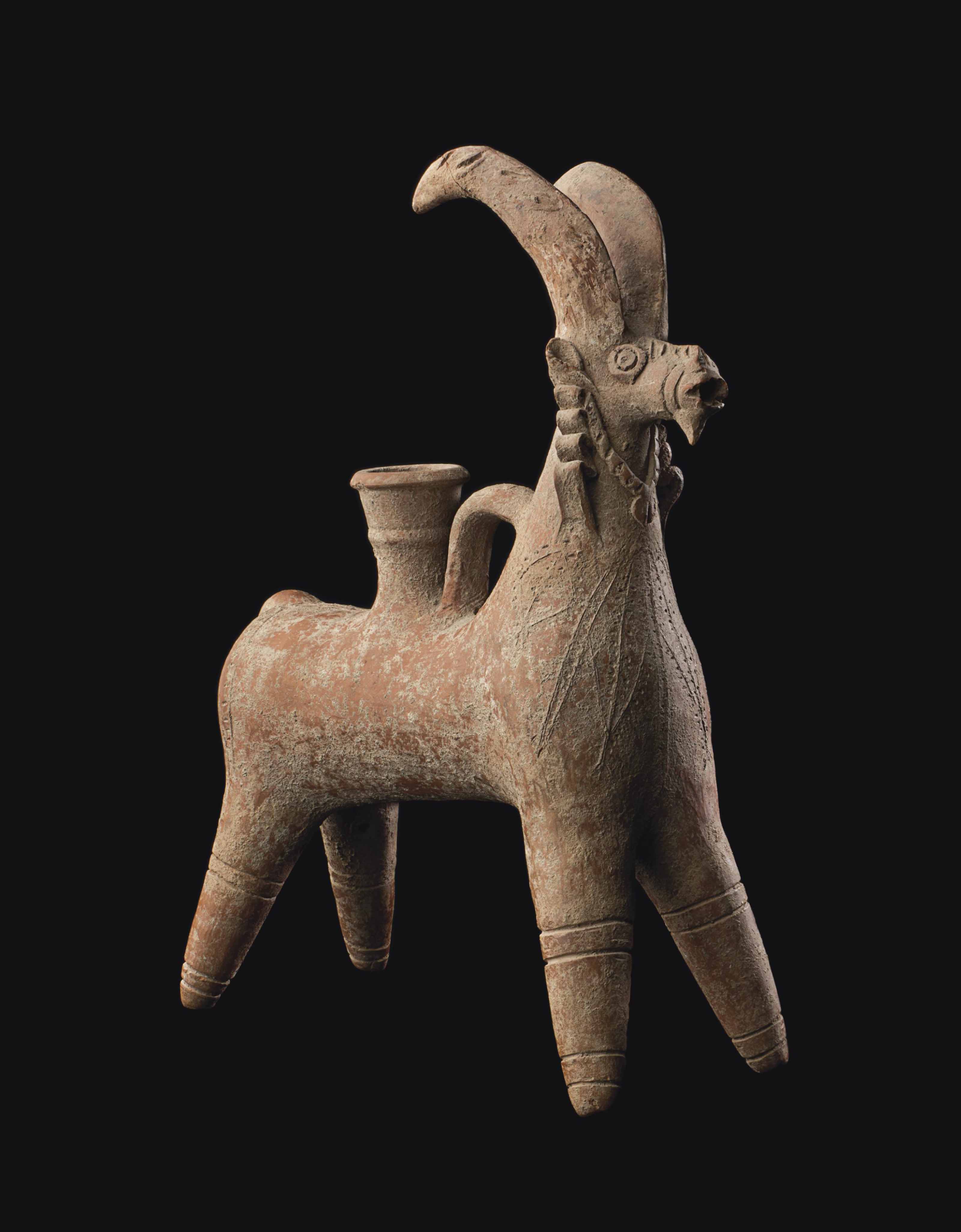 THREE IRANIAN POTTERY ZOOMORPHIC VESSELS , CIRCA 1ST MILLENNIUM B.C