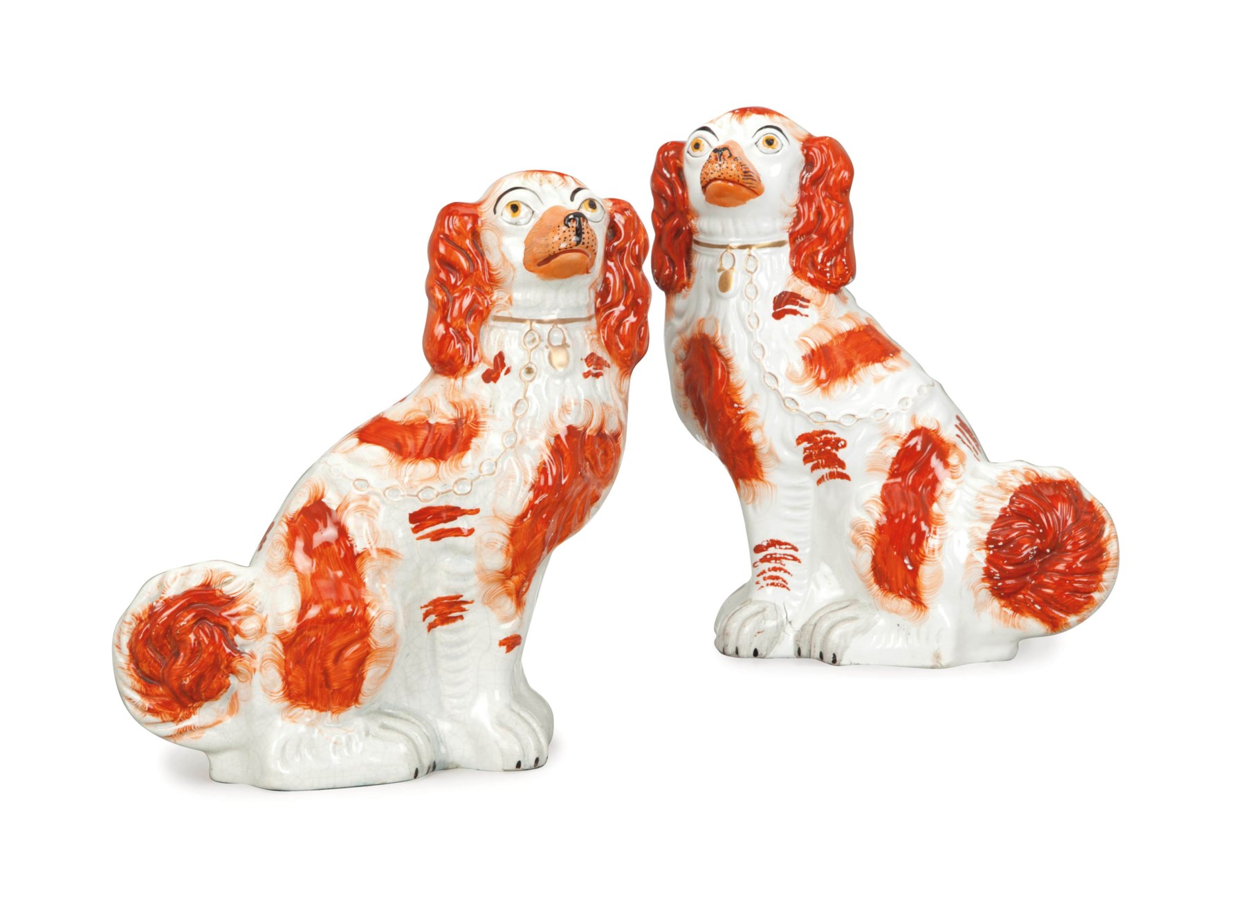 A PAIR OF STAFFORDSHIRE FLATBACK SPANIELS,