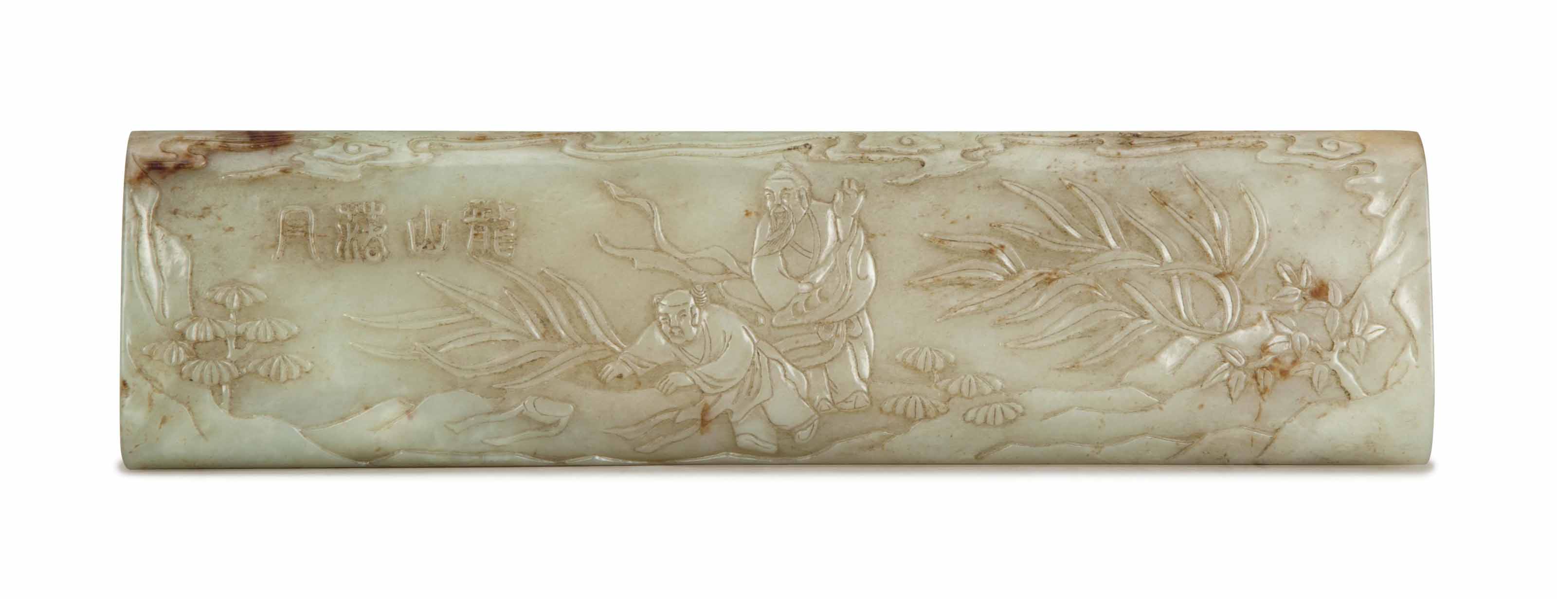 A CHINESE CELADON JADE WRIST REST, Christie's