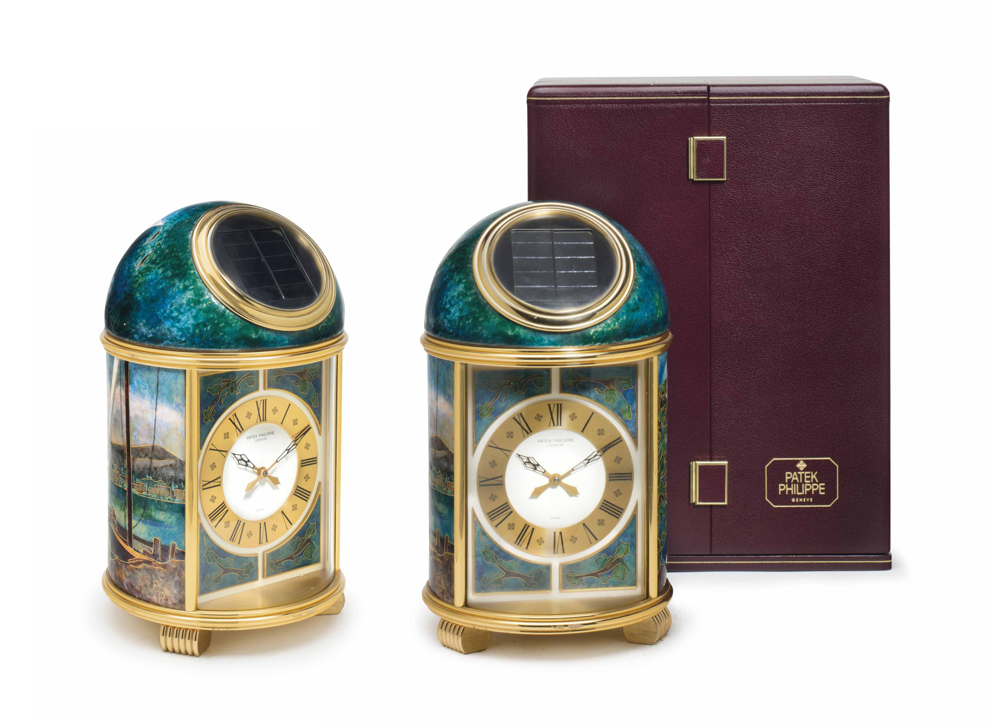 Patek Philippe. A Fine and Unique Gilt Brass Solar-Powered Desk Clock