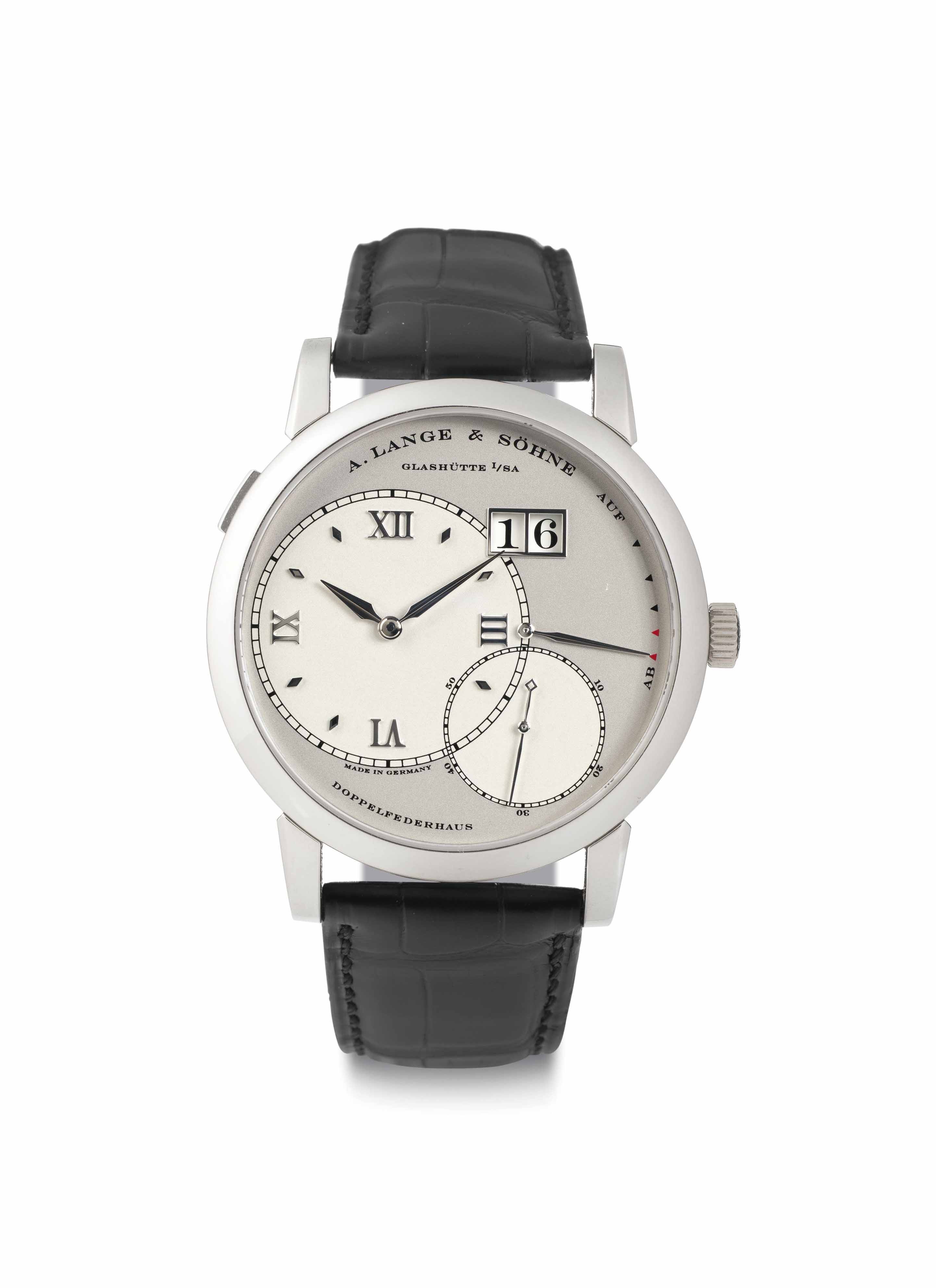 A. Lange & Söhne. A Fine Large Platinum Twin Barrel Wristwatch with