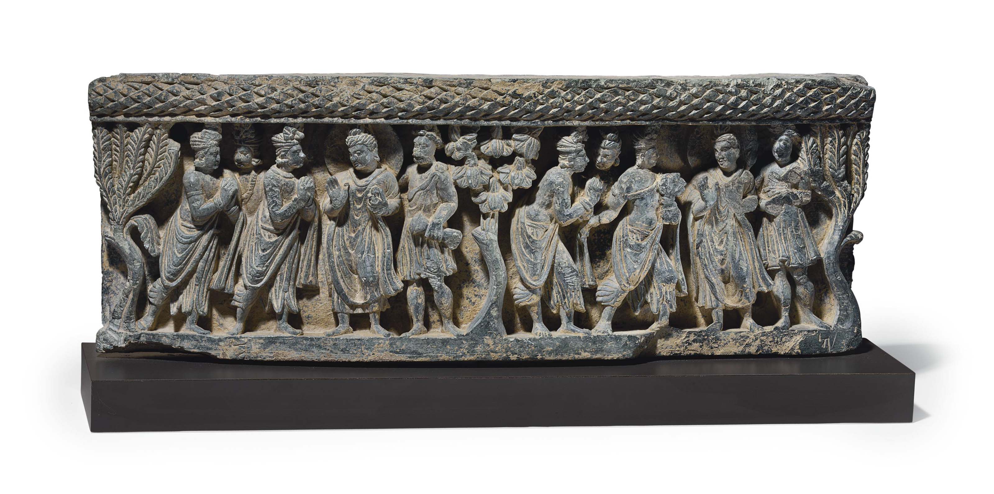 A gray schist relief Buddha receiving golden bowl , GANDHARA, 2ND/3RD ...