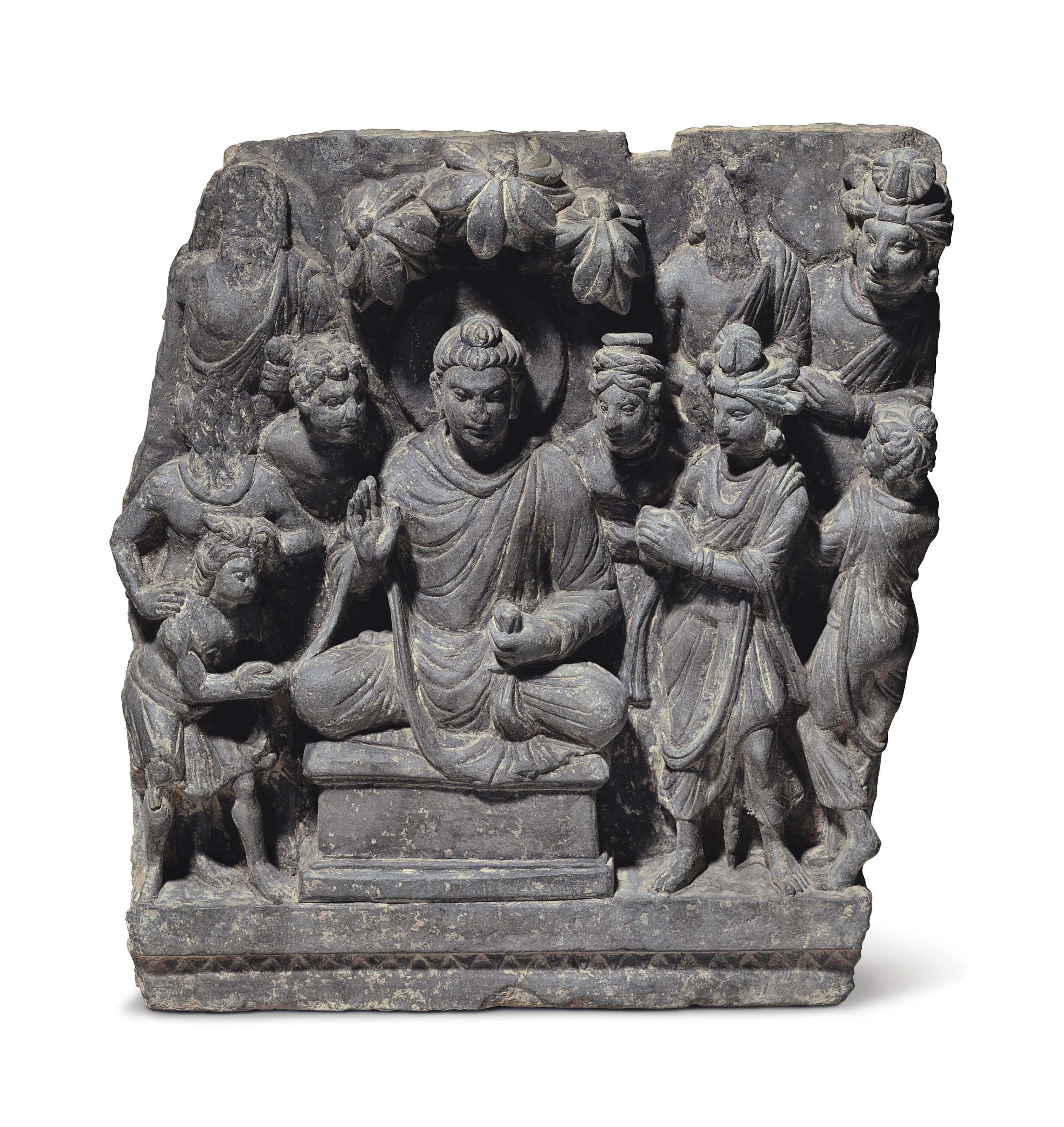 A gray schist relief Buddha receiving golden bowl , GANDHARA, 2ND/3RD ...
