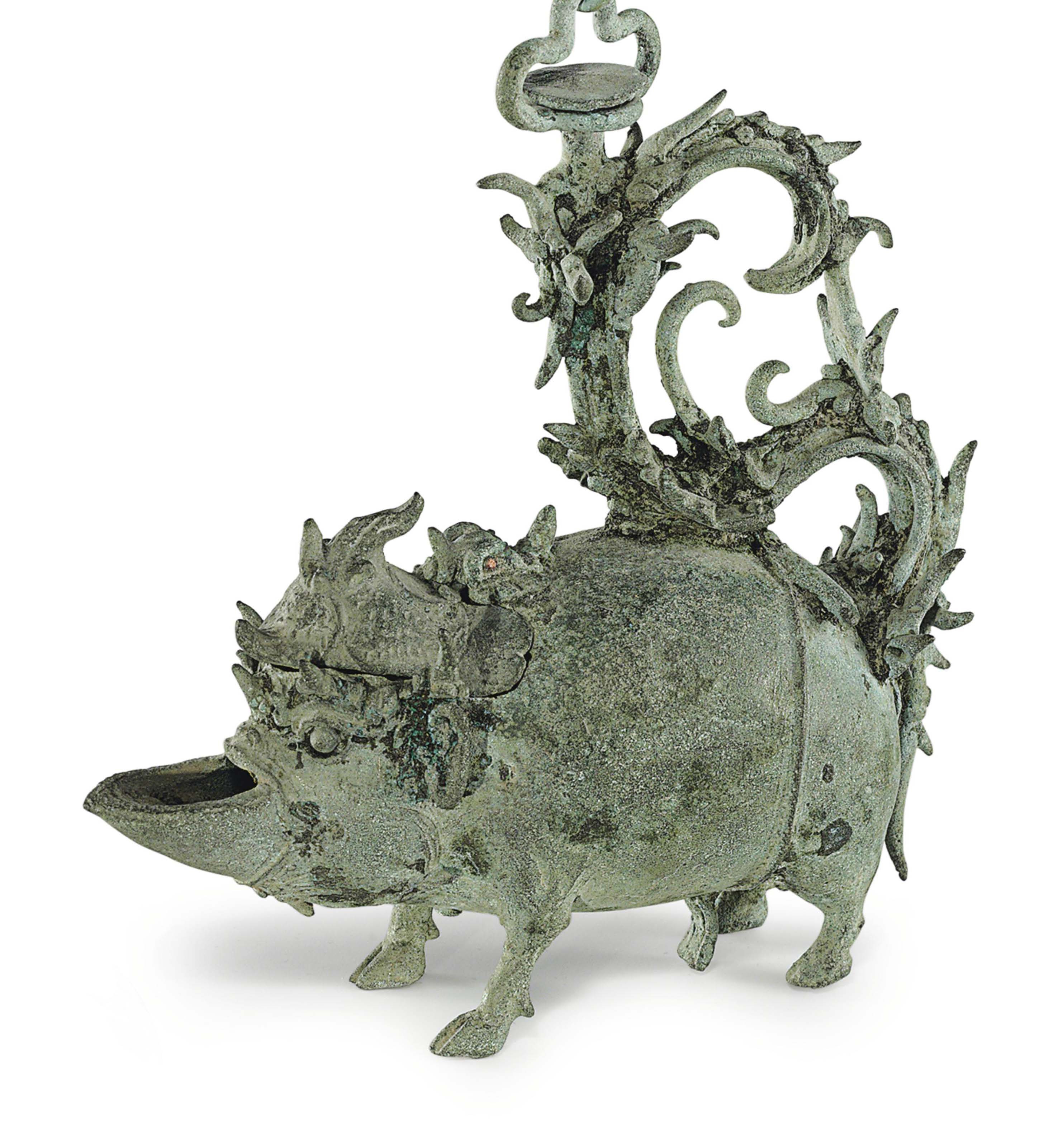 A bronze oil lamp , INDONESIA, JAVA, CIRCA 11TH CENTURY ...