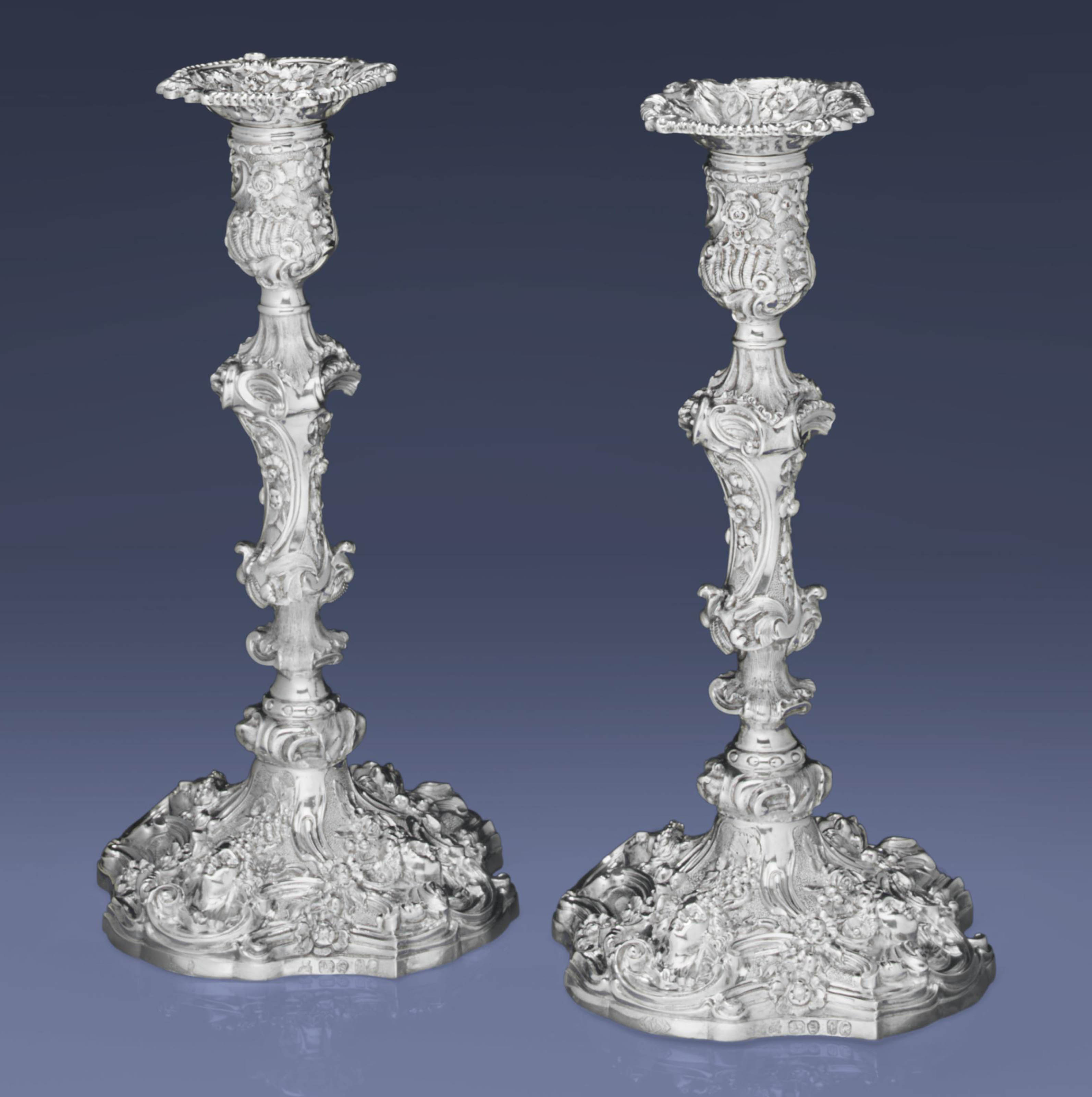 A PAIR OF VICTORIAN SILVER CANDLESTICKS , MARK OF ROBERT GARRARD