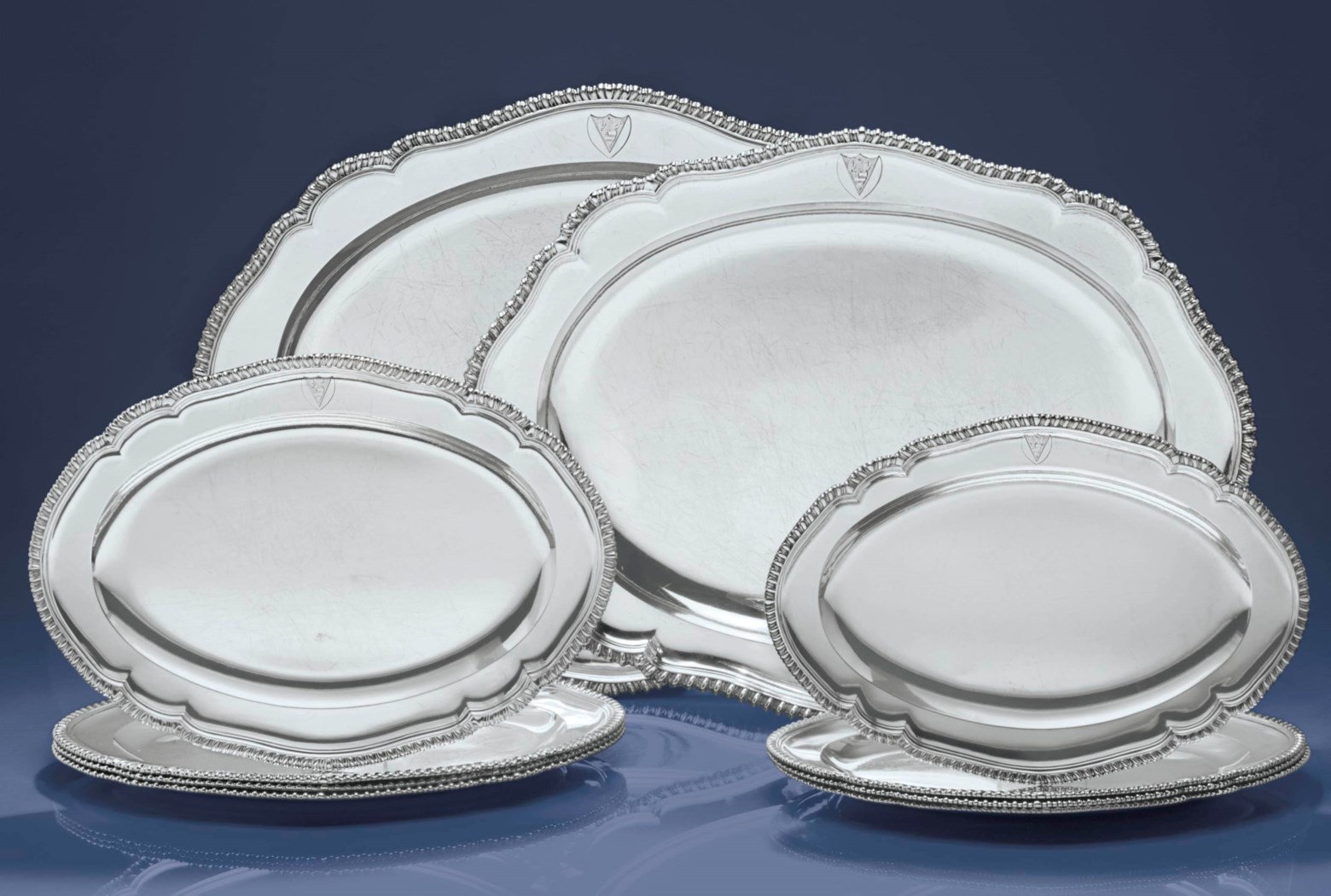 A SUITE OF TEN II/III SILVER MEAT DISHES