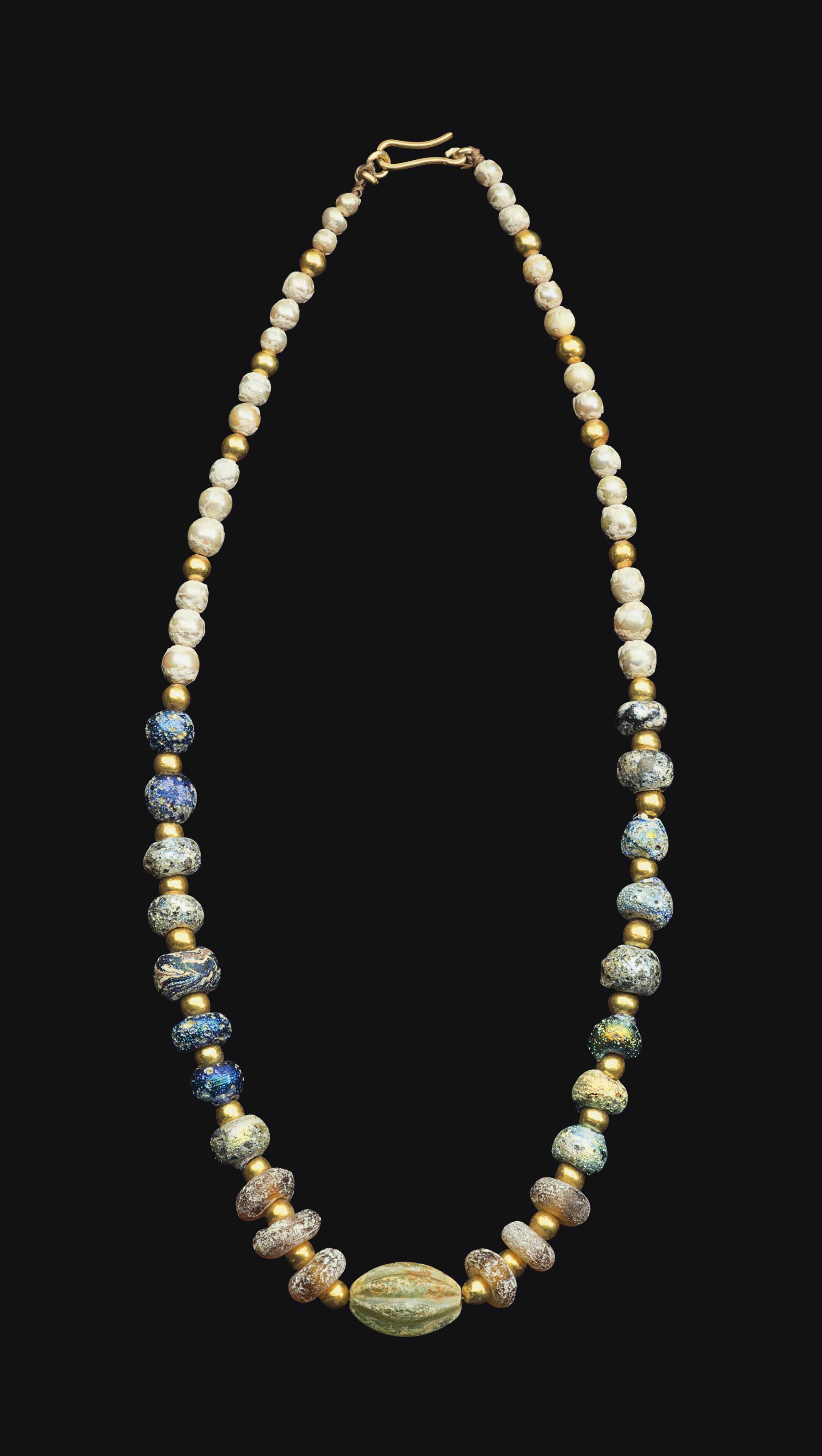 A ROMAN GLASS BEAD NECKLACE , CIRCA 1ST2ND CENTURY A.D. Christie's