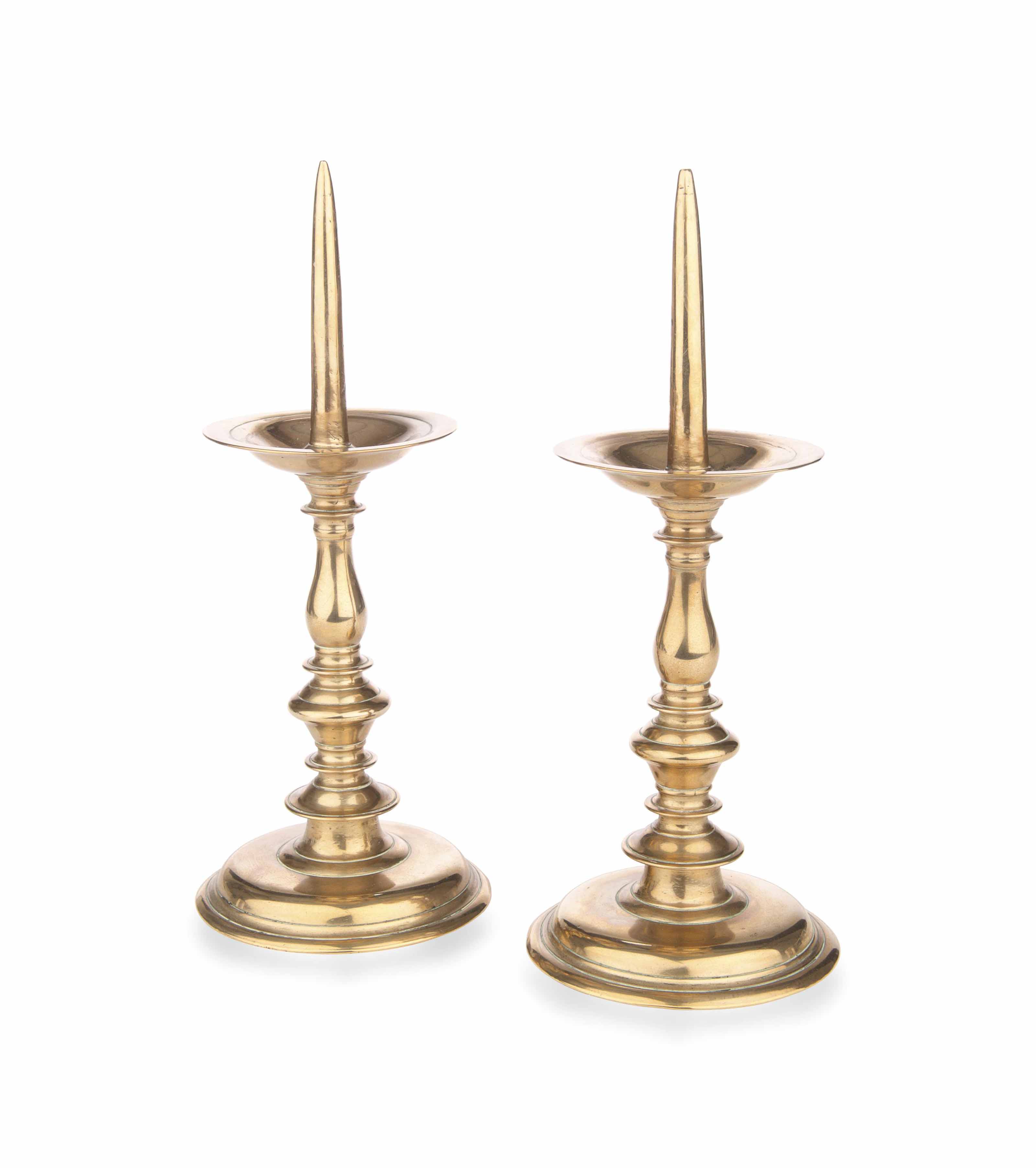 A PAIR OF BRASS PRICKET CANDLESTICKS , NETHERLANDISH, EARLY 17TH