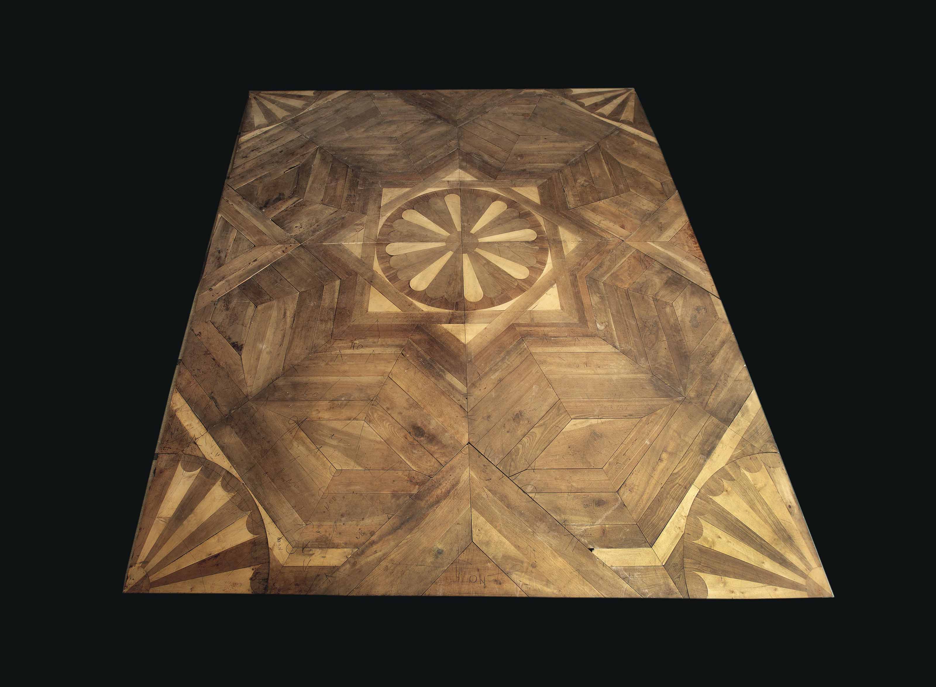 An Italian walnut, maple, mahogany and cherrywood parquet floor