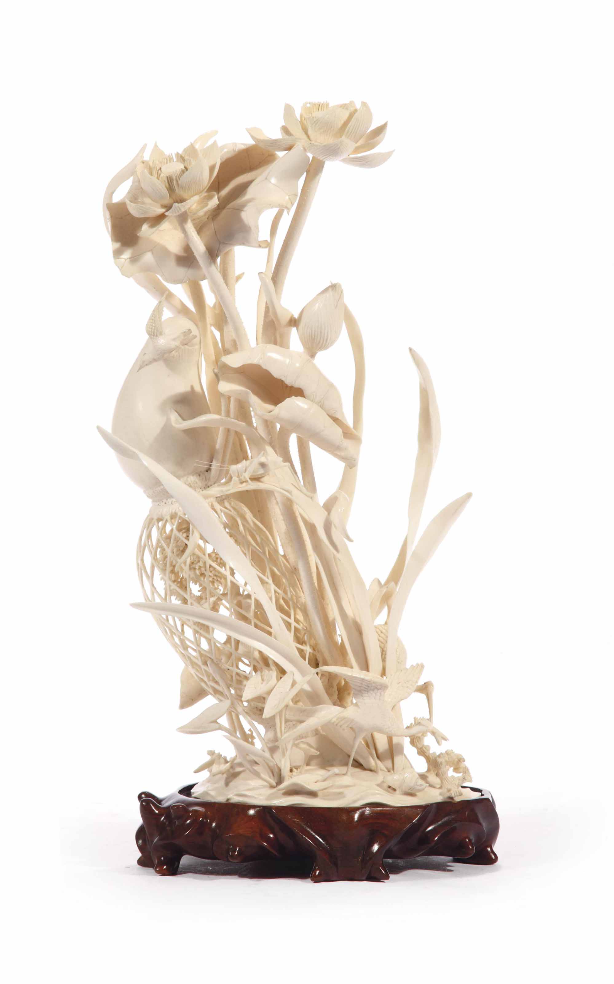 A Chinese ivory carving of lotus , CIRCA 1900 Christie's